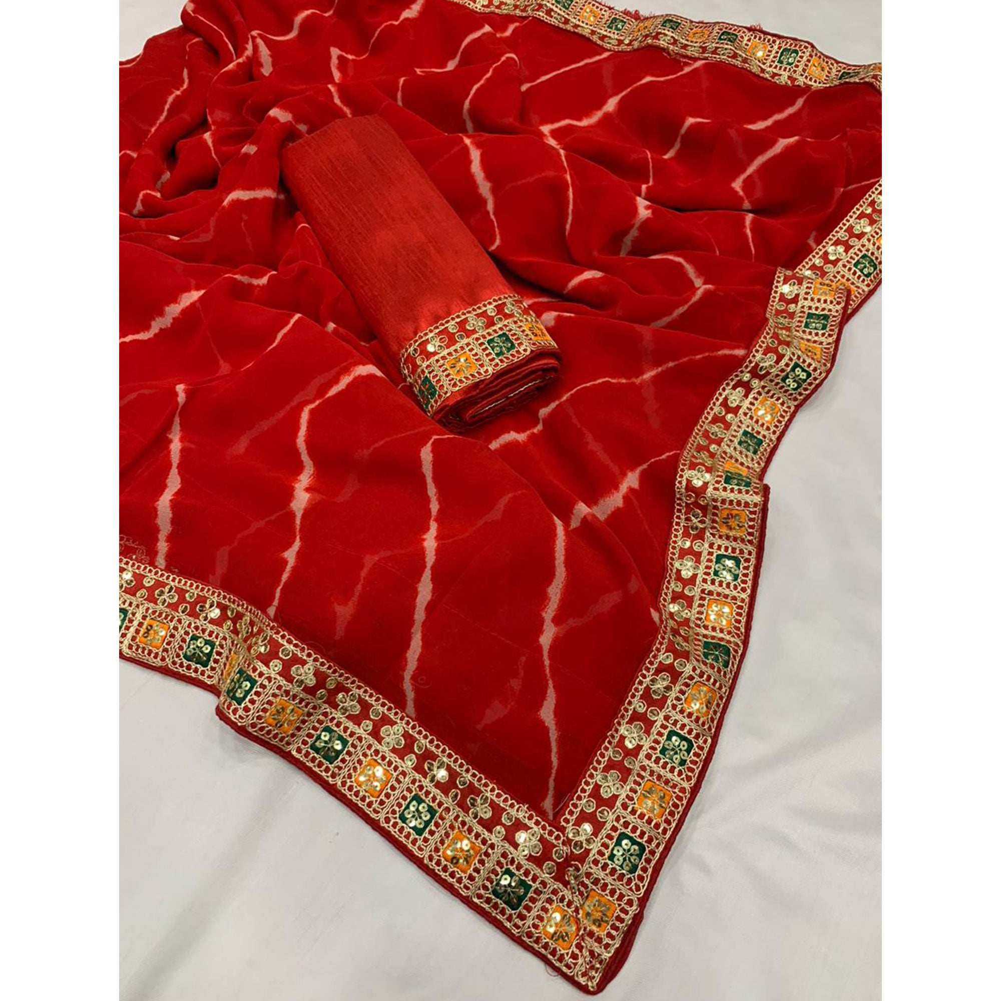 Red Leheriya Printed Georgette Saree With Sequins Border