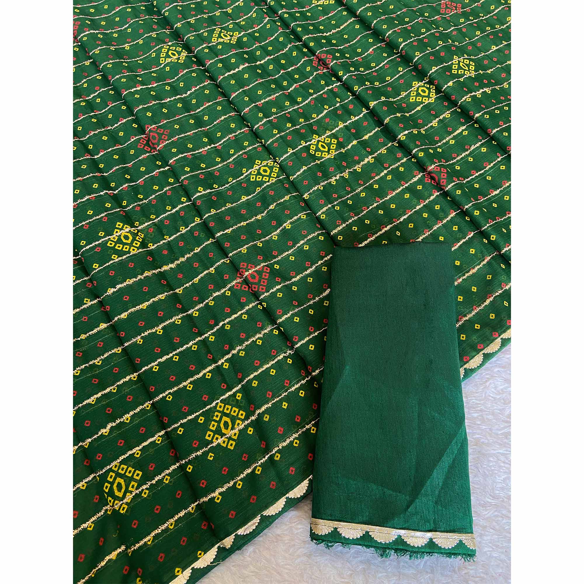 Green Bandhani Printed Chiffon Saree with Graceful Touches of Zari Work