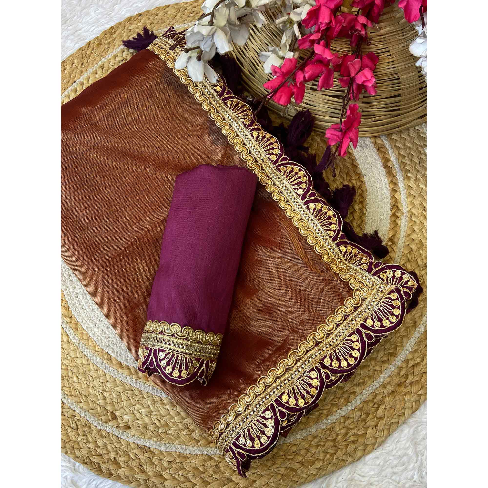 Orange Net Saree With Intricate Sequin Embroidery & Tassel Embellished Pallu