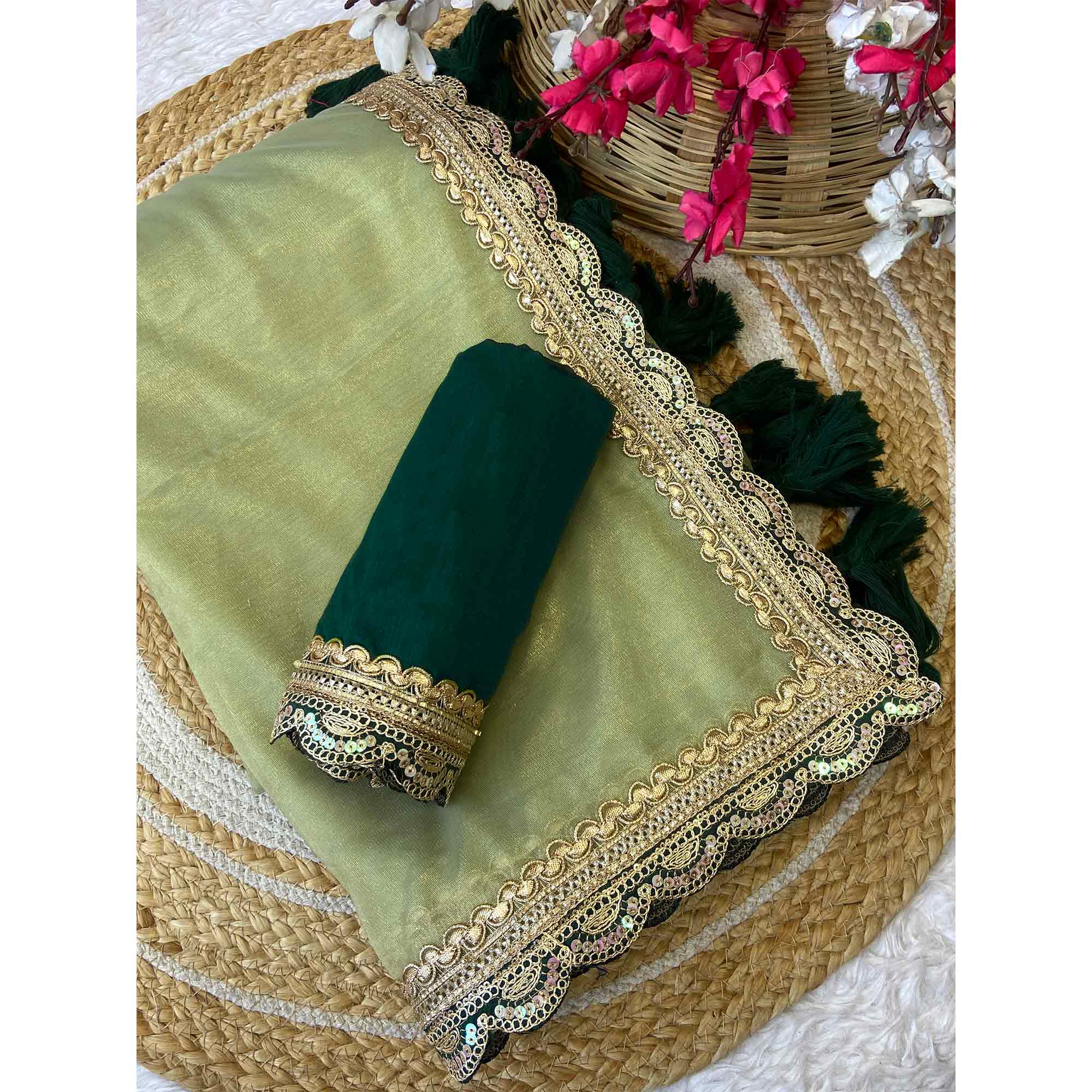 Pista Green Net Saree With Intricate Sequin Embroidery & Tassel Embellished Pallu