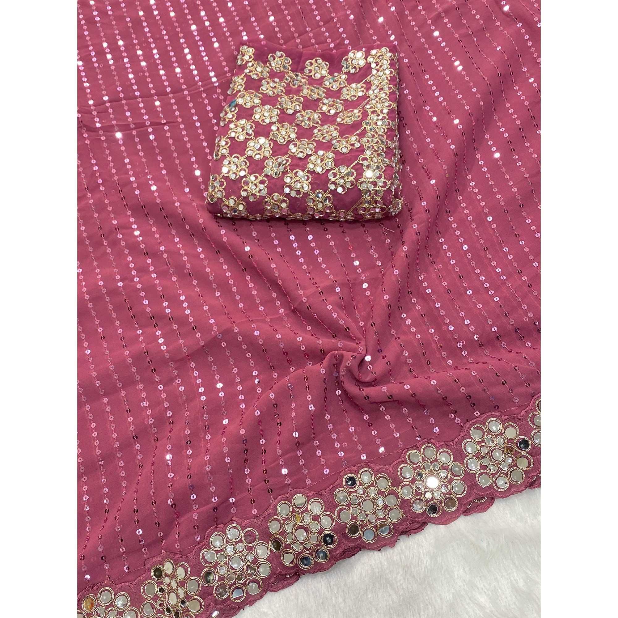 Stunning Pink Georgette Party Wear Saree Adorned with Heavy Sequins Embellishment