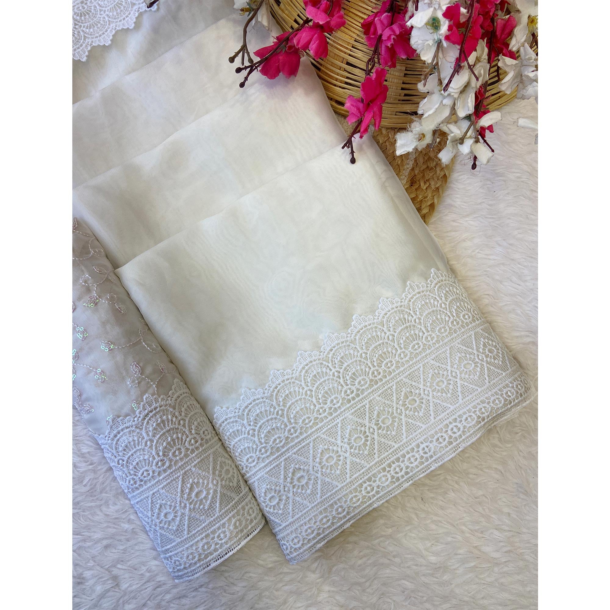 White Solid Satin Rangoli Saree Enhanced with Intricate Embroidered Border Work