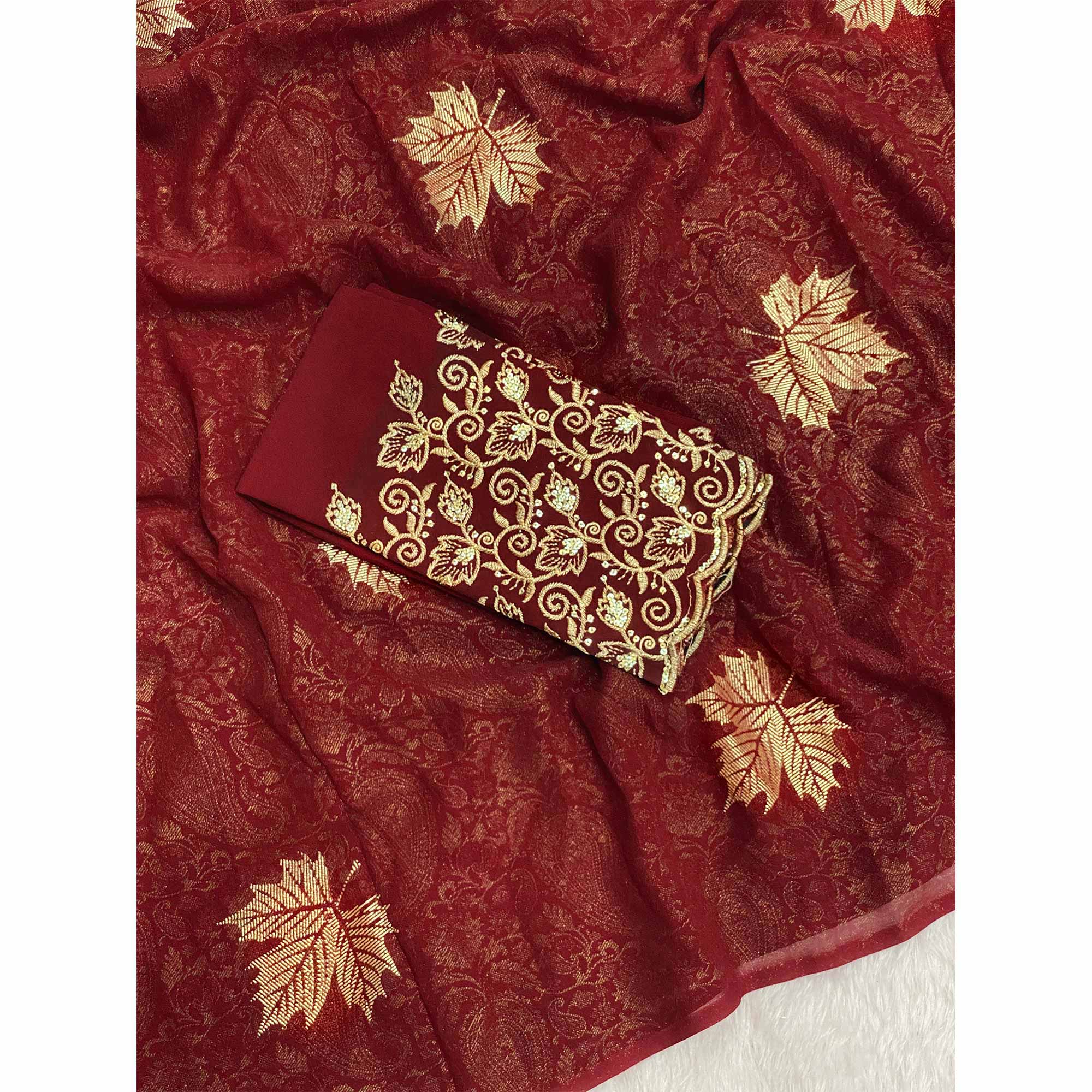 Maroon Georgette Saree With Foil Printed Paisley & Leaf Motifs Finished With A Tassel Pallu