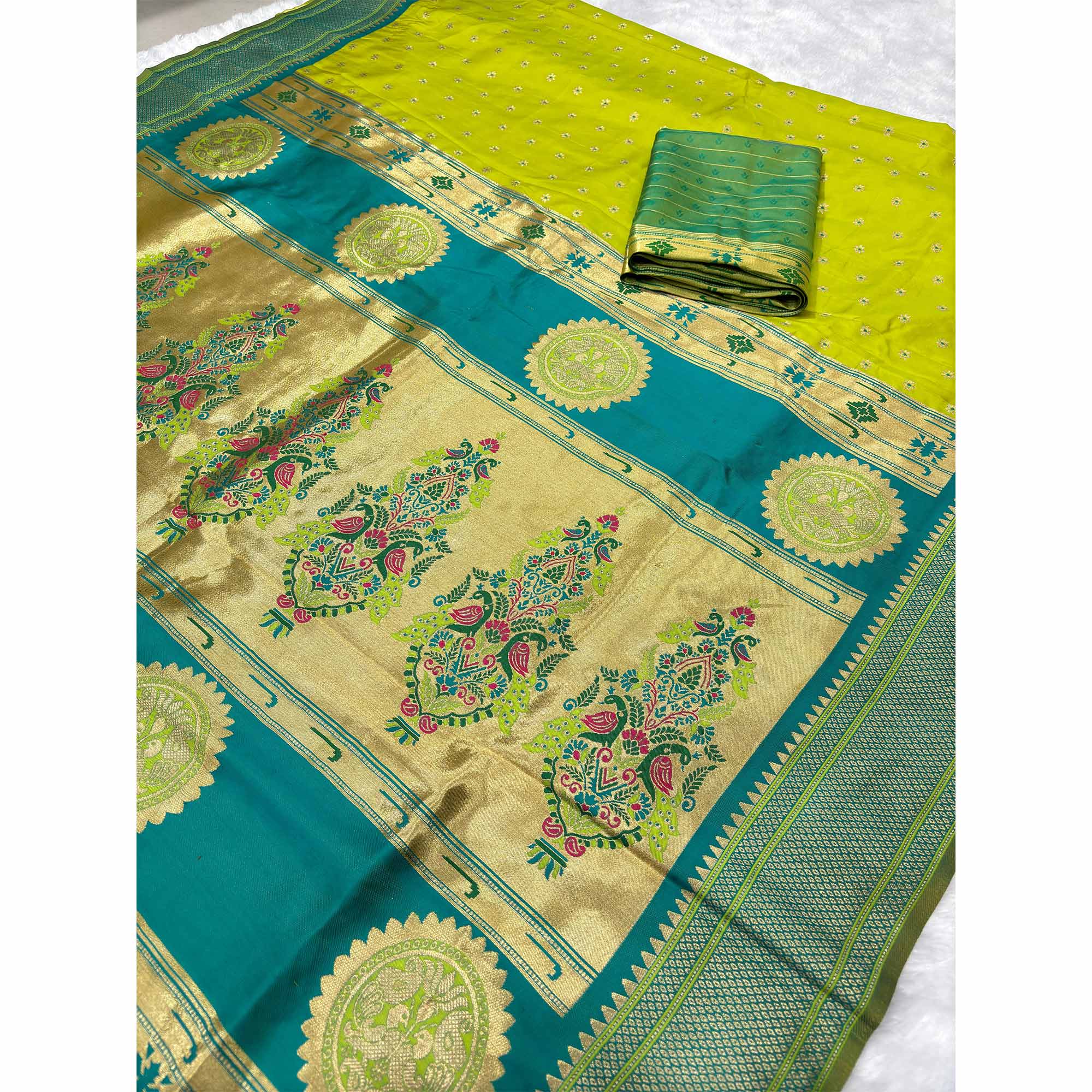 Graceful Green Silk Blend Saree Adorned With Intricate Floral Zari Weaving
