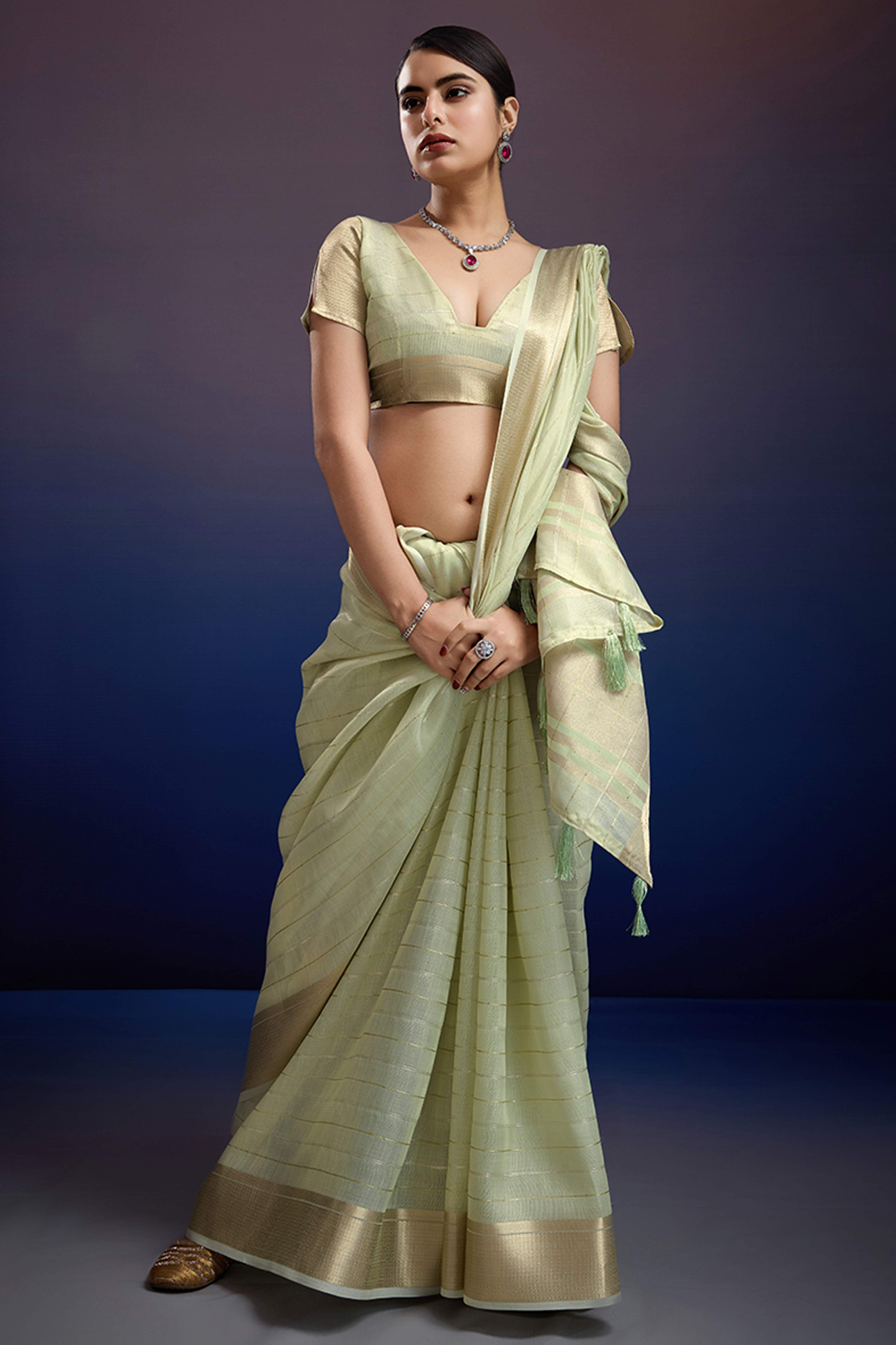 Pista Green Pure Linen Saree with Gold Toned Zari Weave