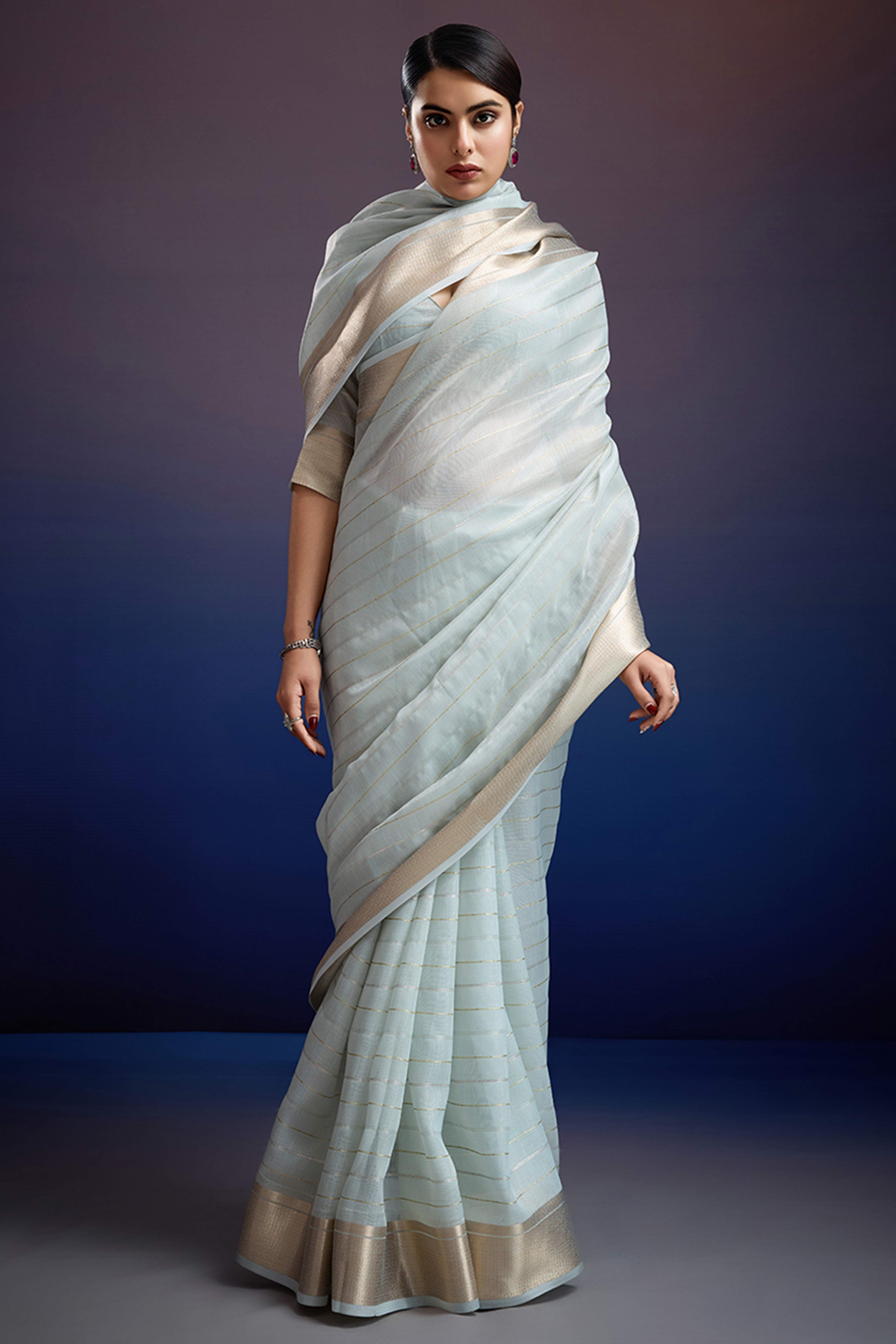 Pastel Blue Pure Linen Saree with Gold Toned Zari Weave