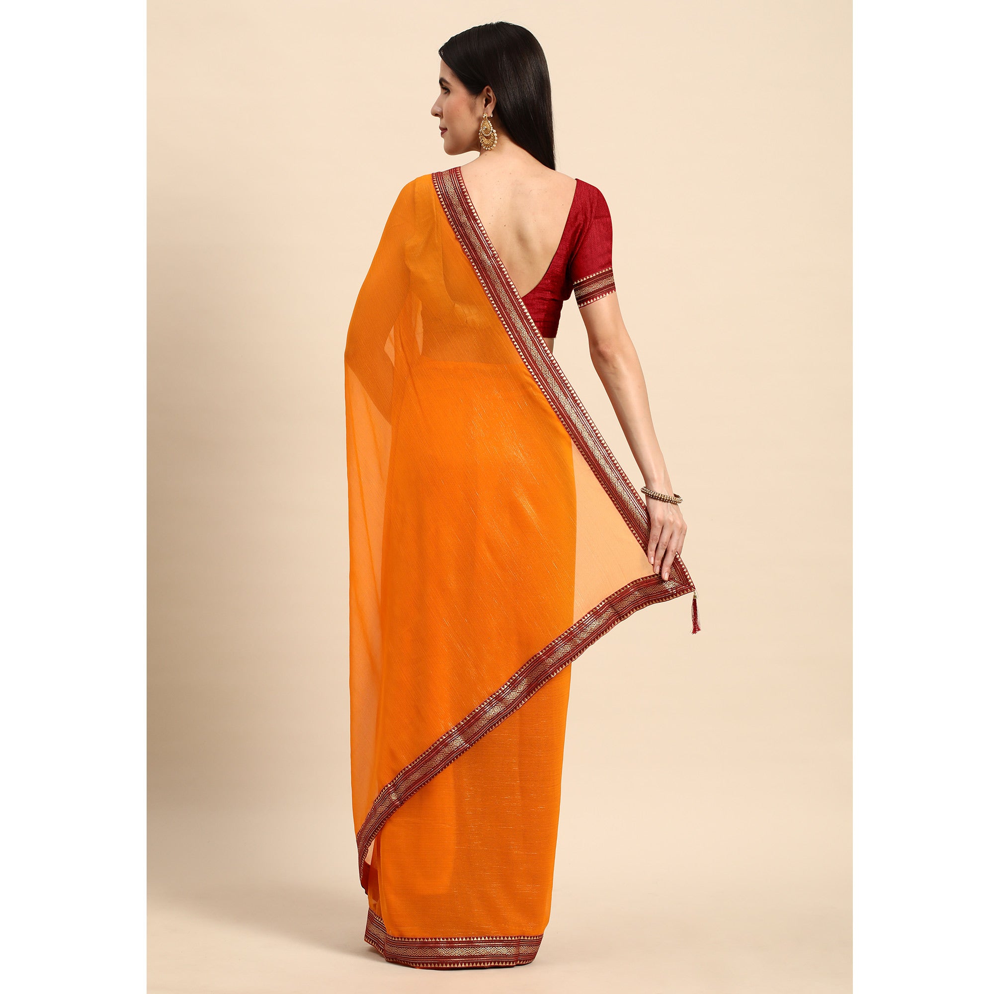 Yellow Solid With Woven Border Chiffon Saree With Tassels