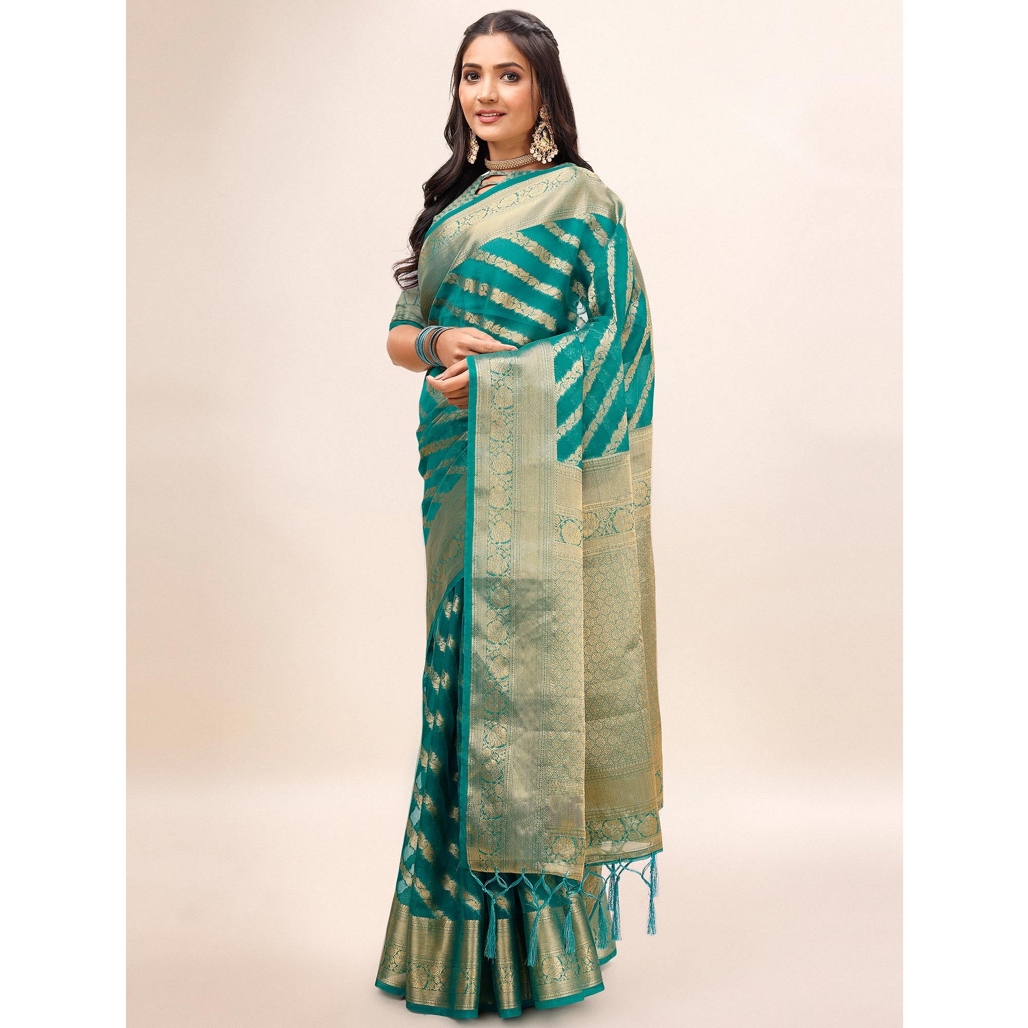 Rama Green Woven Organza Saree With Tassels