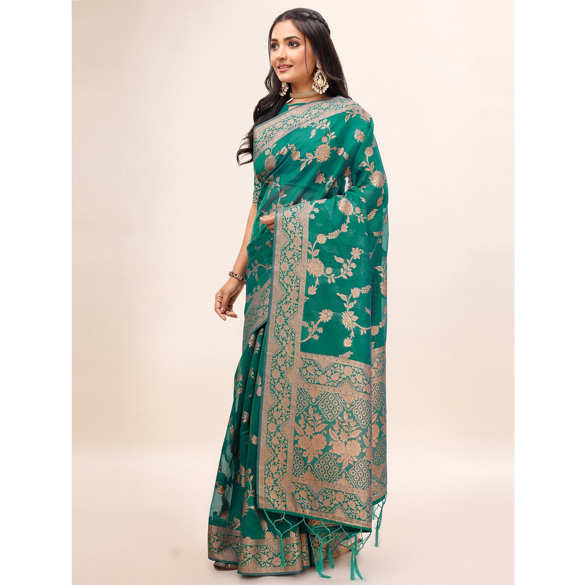 Green Woven Organza Saree With Tassels