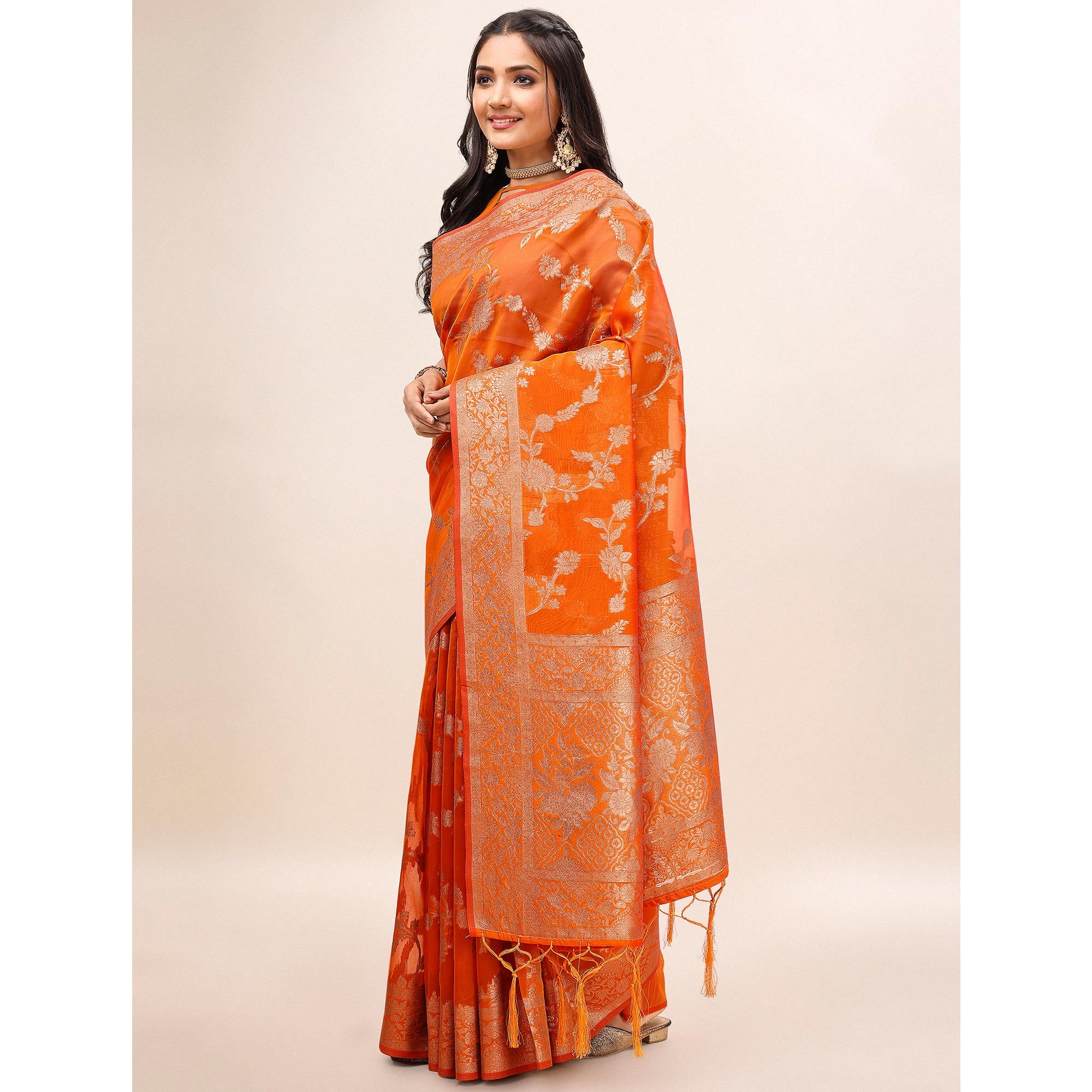 Orange Woven Organza Saree With Tassels