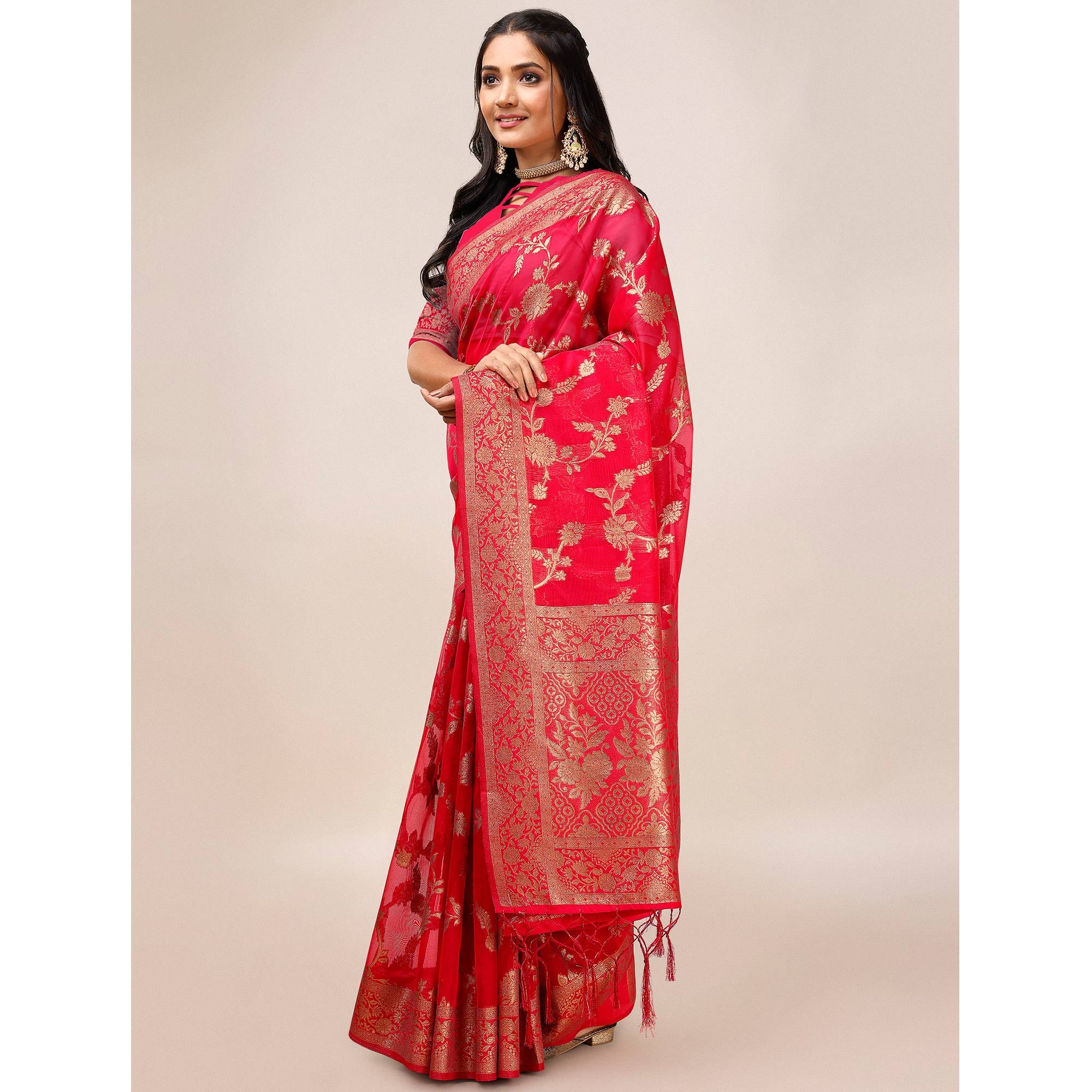 Pink Woven Organza Saree With Tassels