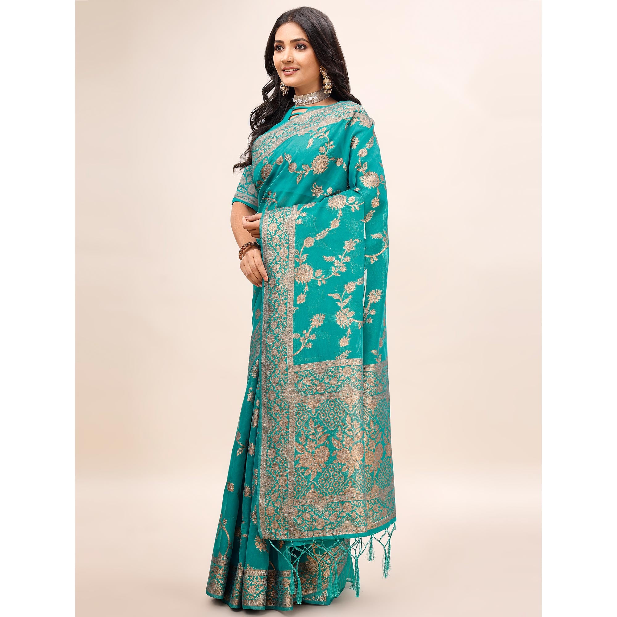 Rama Green Woven Organza Saree With Tassels