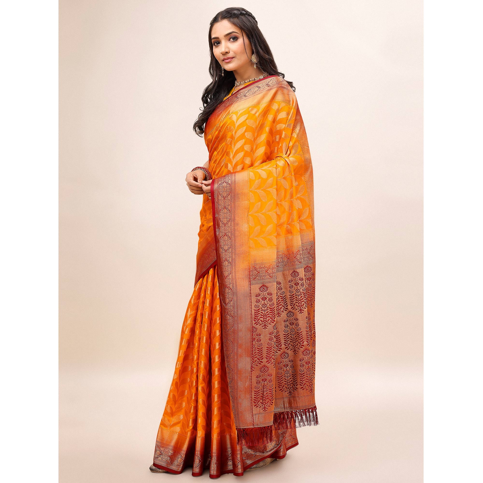 Orange Woven Dola Silk Saree With Tassels