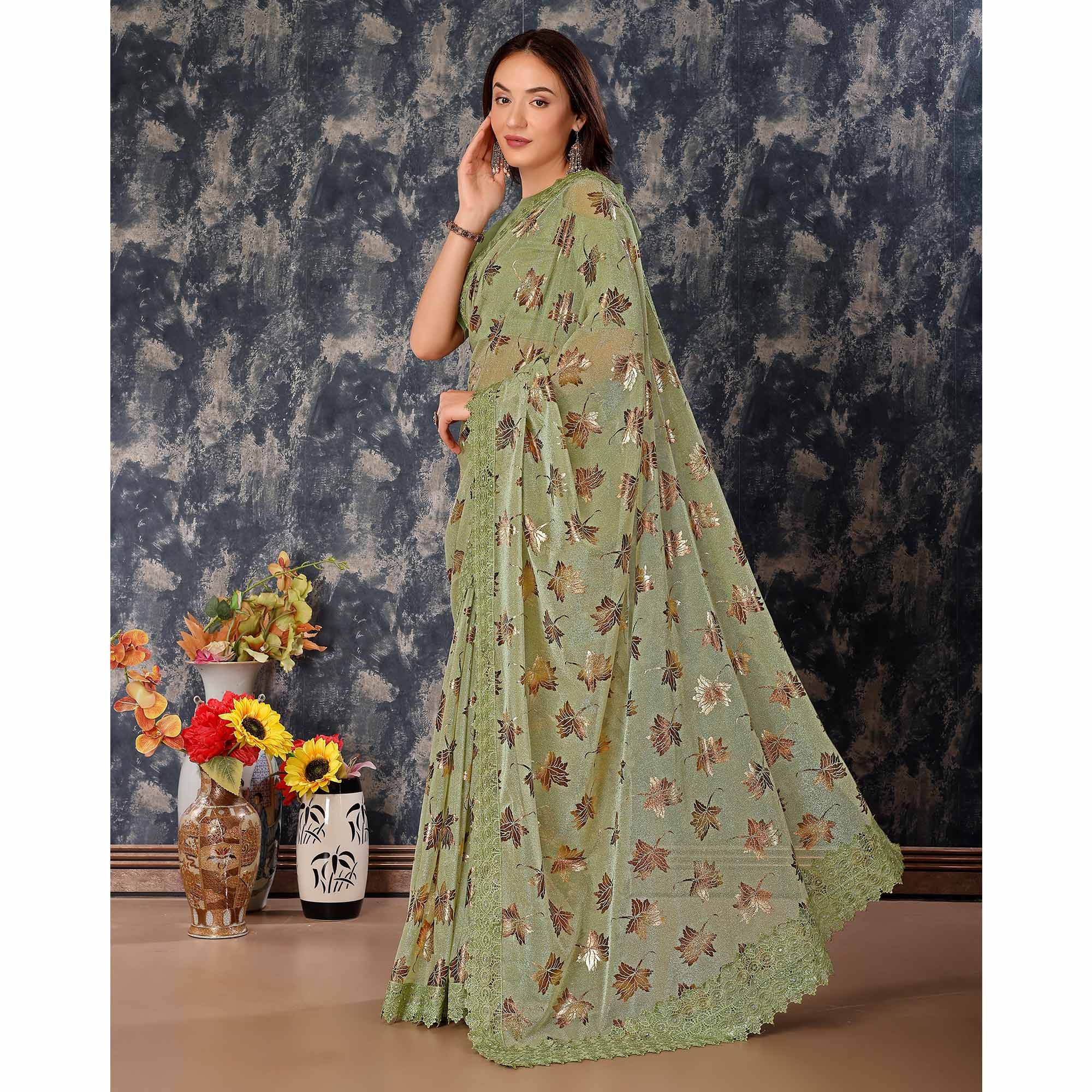 Green Foil Printed Lycra Saree With Embroidered Lace Border