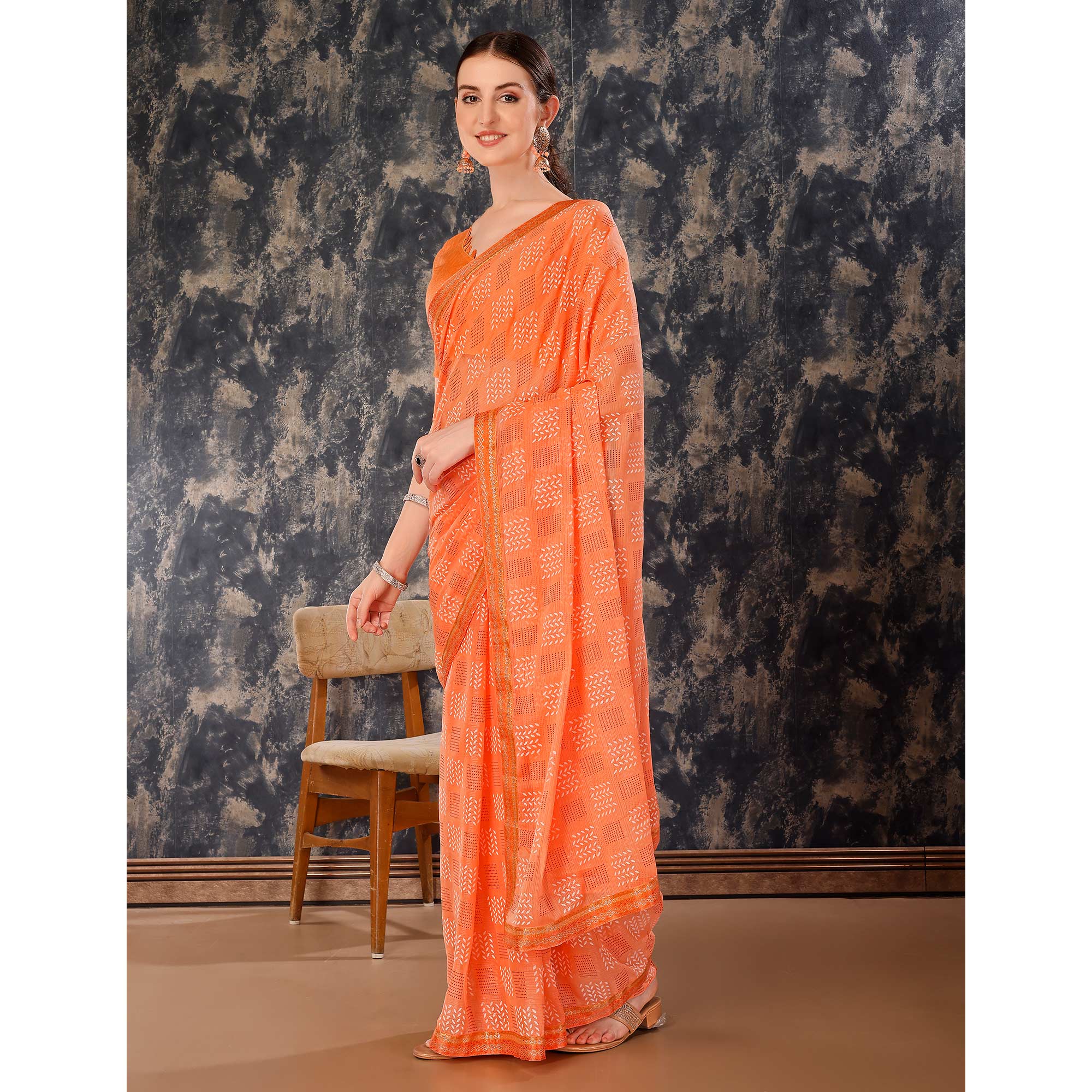 Light Orange Printed Chiffon Saree With Lace Border