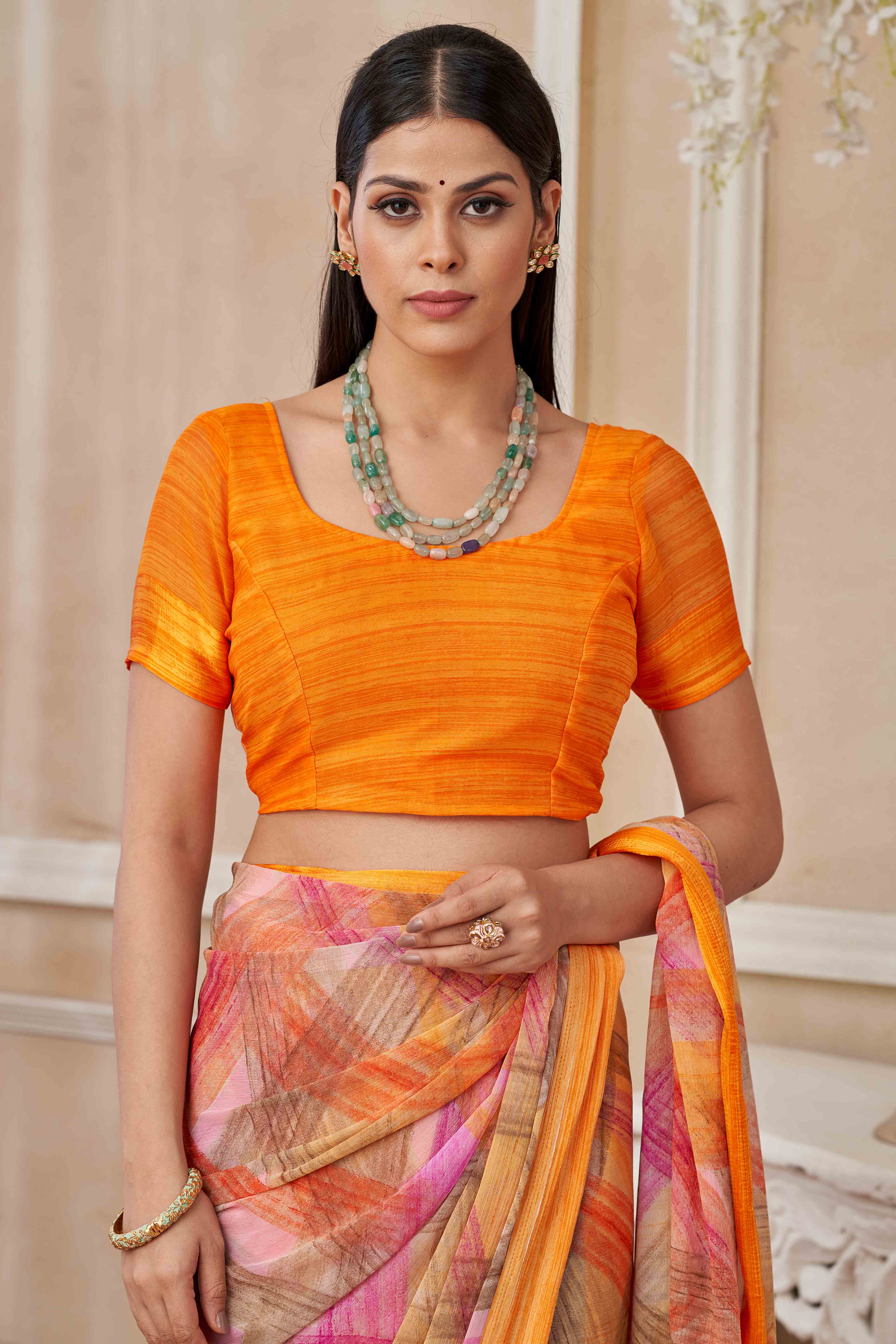 Orange Chiffon Saree With Delicate Prints & Elegant Satin Woven Border