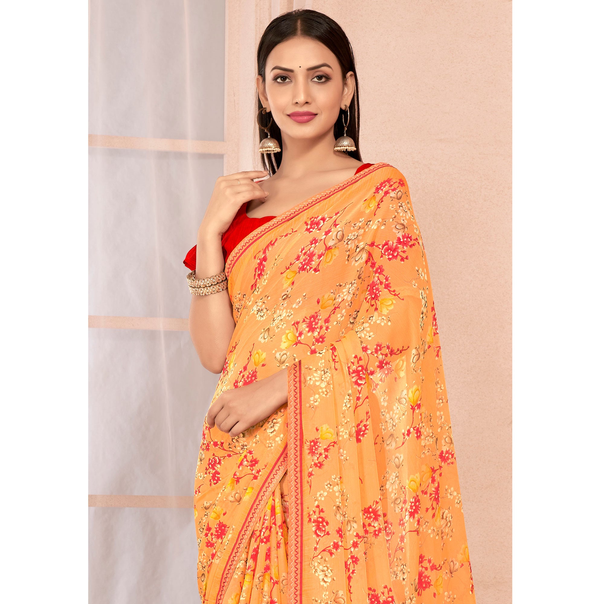 Light Orange Floral Printed Chiffon Saree With Lace Border