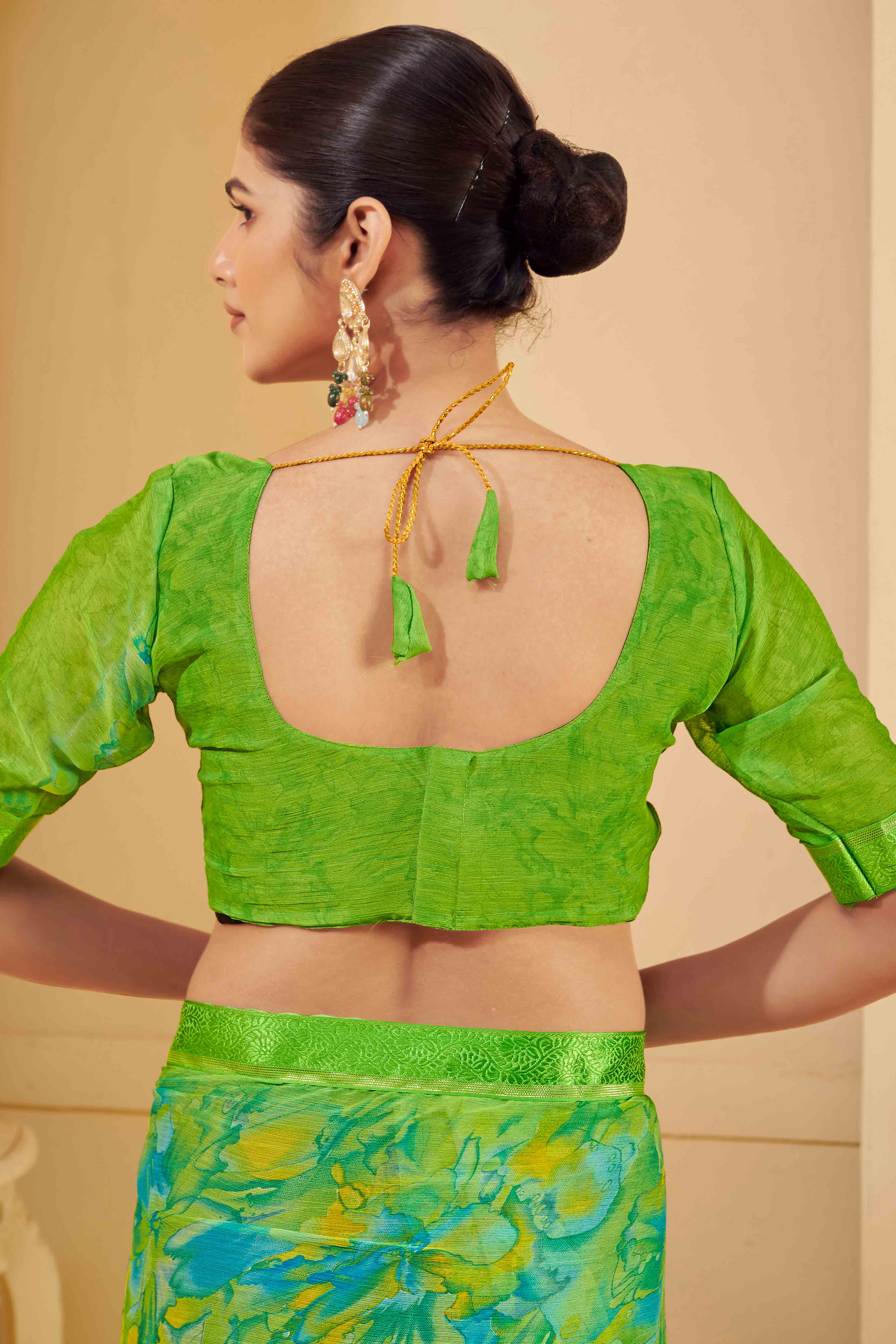 Green Chiffon Saree Adorned With Artistic Floral Print & Finely Crafted Woven Lace Border