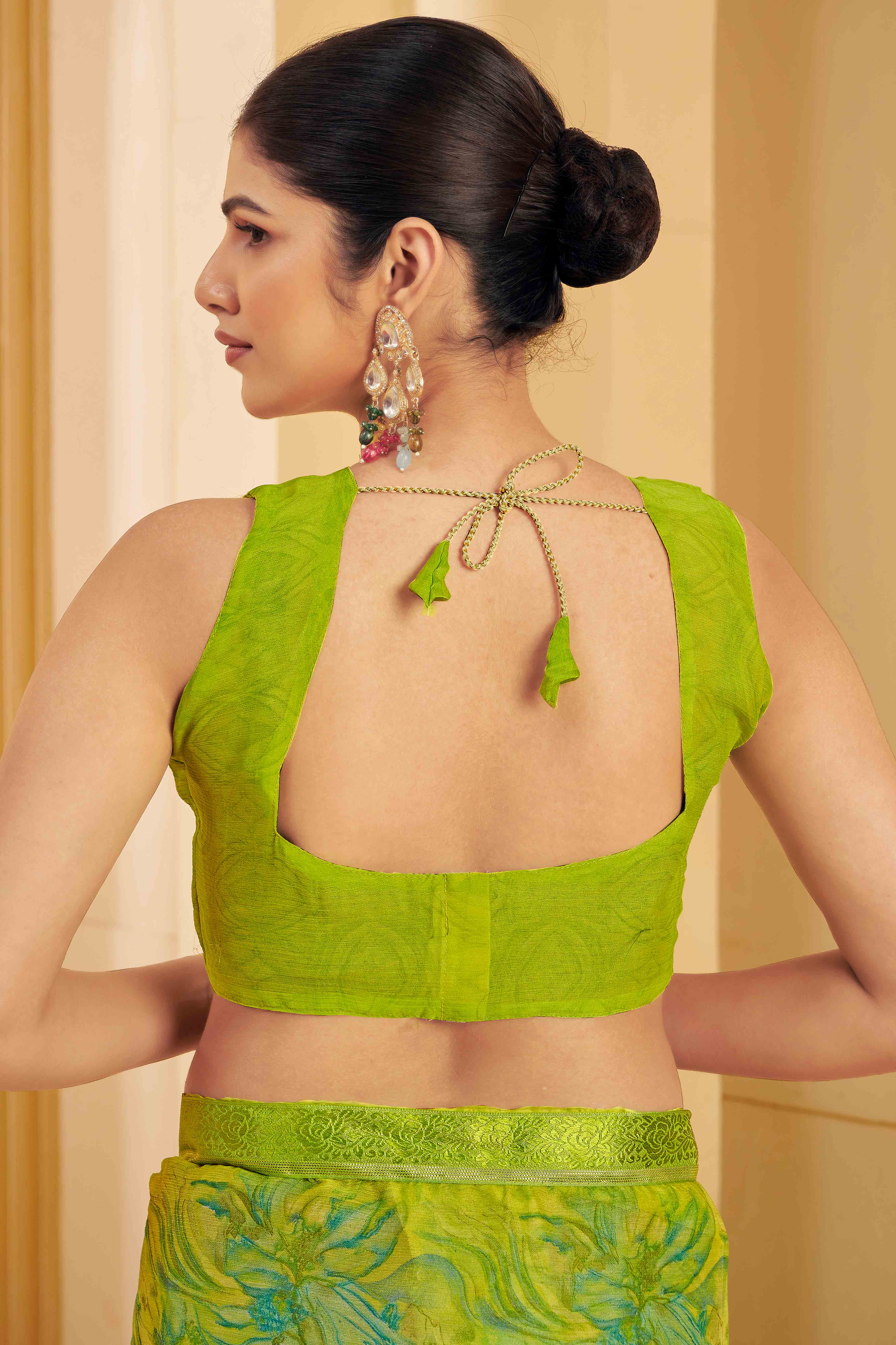 Green Chiffon Saree Adorned With Artistic Floral Print & Finely Crafted Woven Lace Border