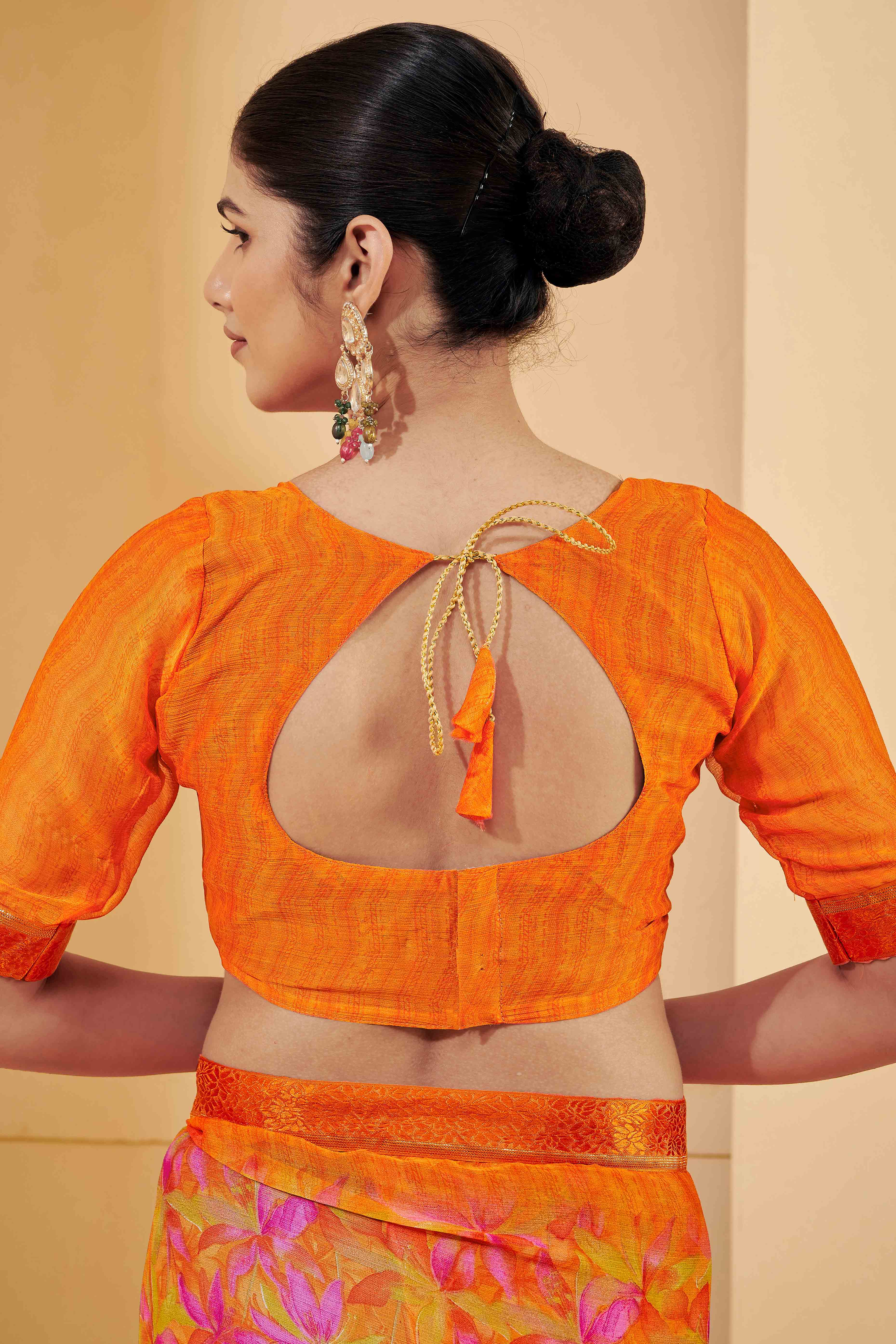 Orange Chiffon Saree Adorned With Artistic Floral Print & Finely Crafted Woven Lace Border