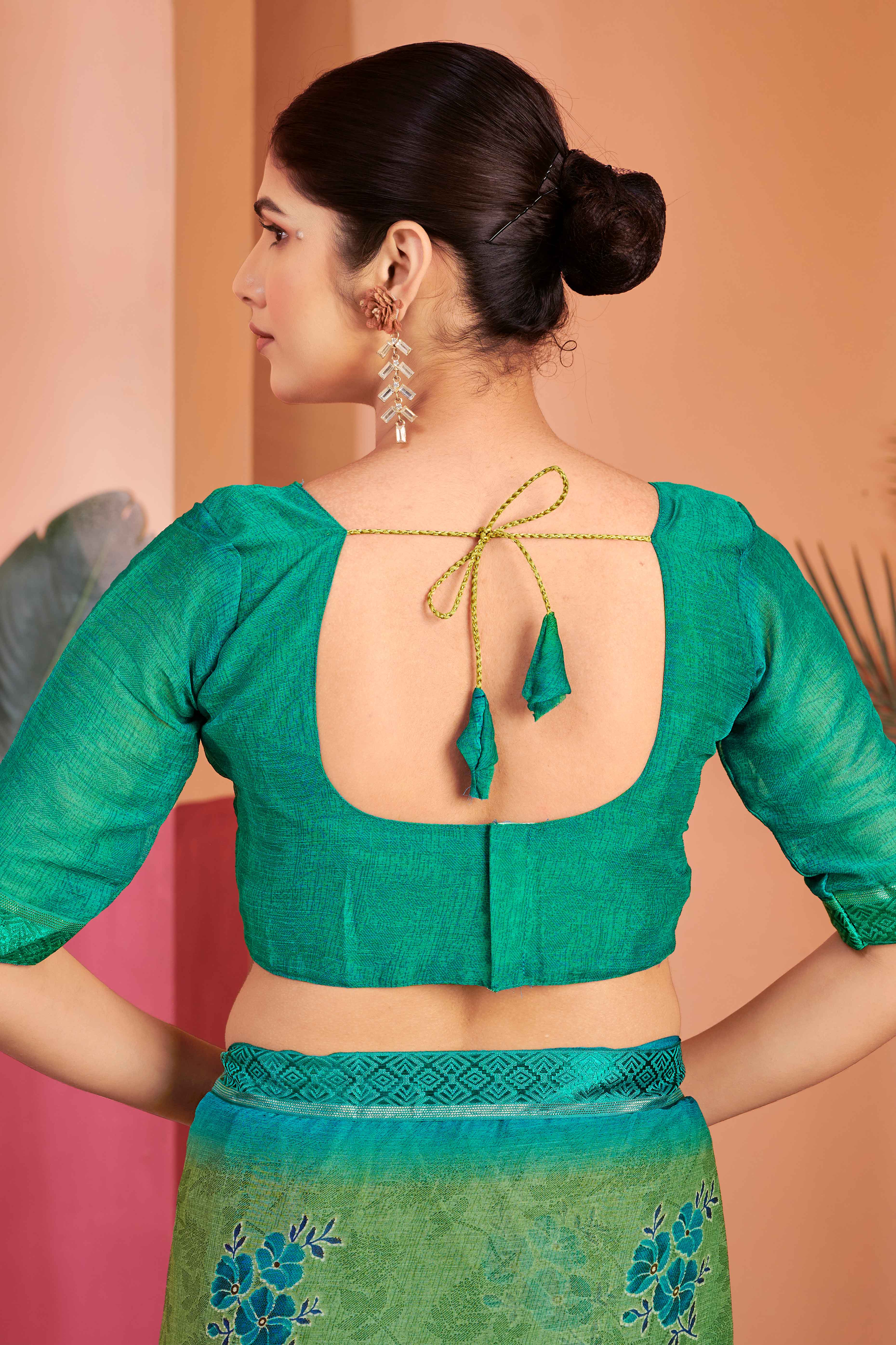 Green Chiffon Saree Featuring Delicate Floral Prints & A Graceful Lace Border