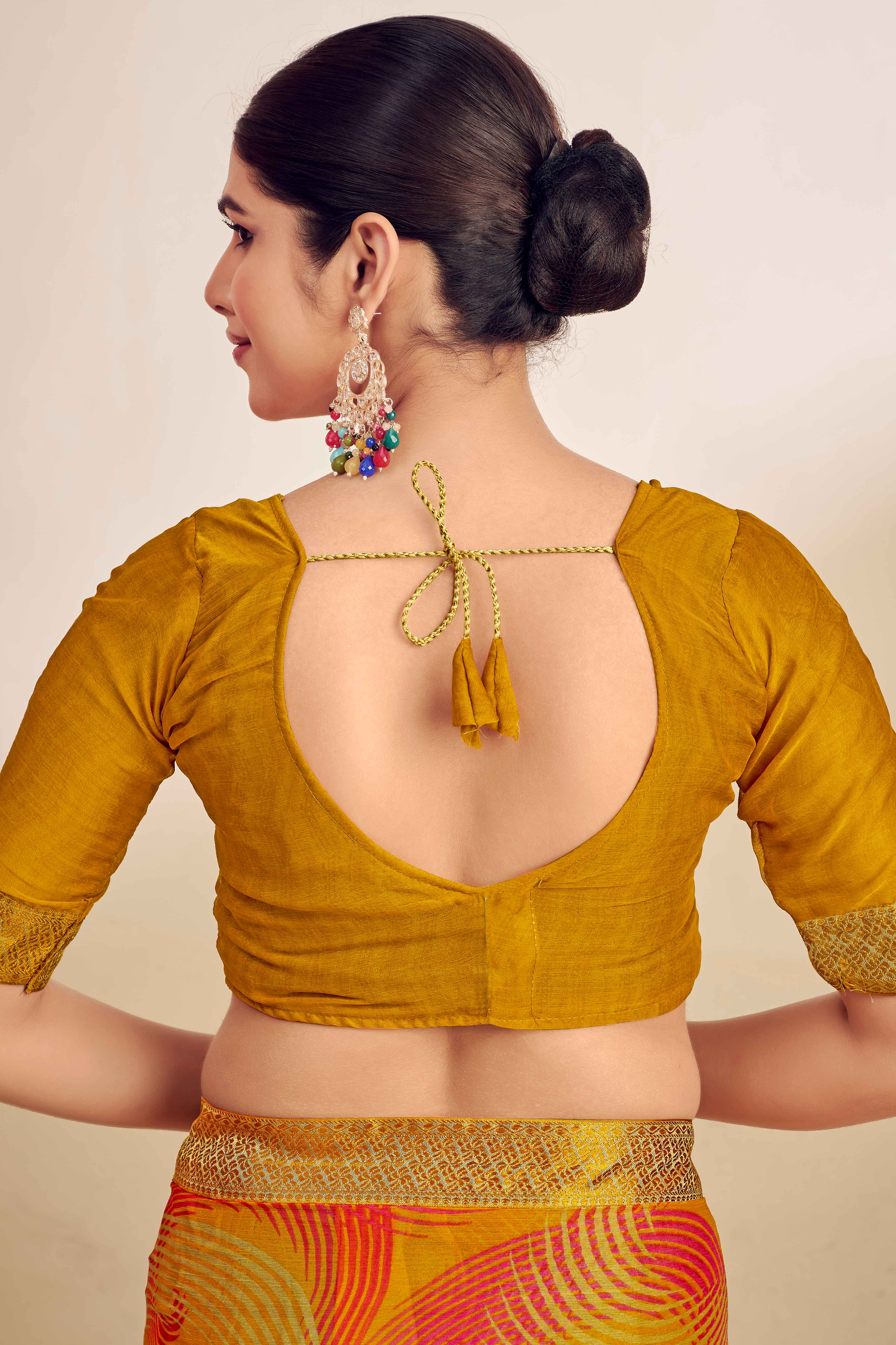 Mustard Chiffon Saree Adorned With Artistic Print & Finely Crafted Woven Lace Border