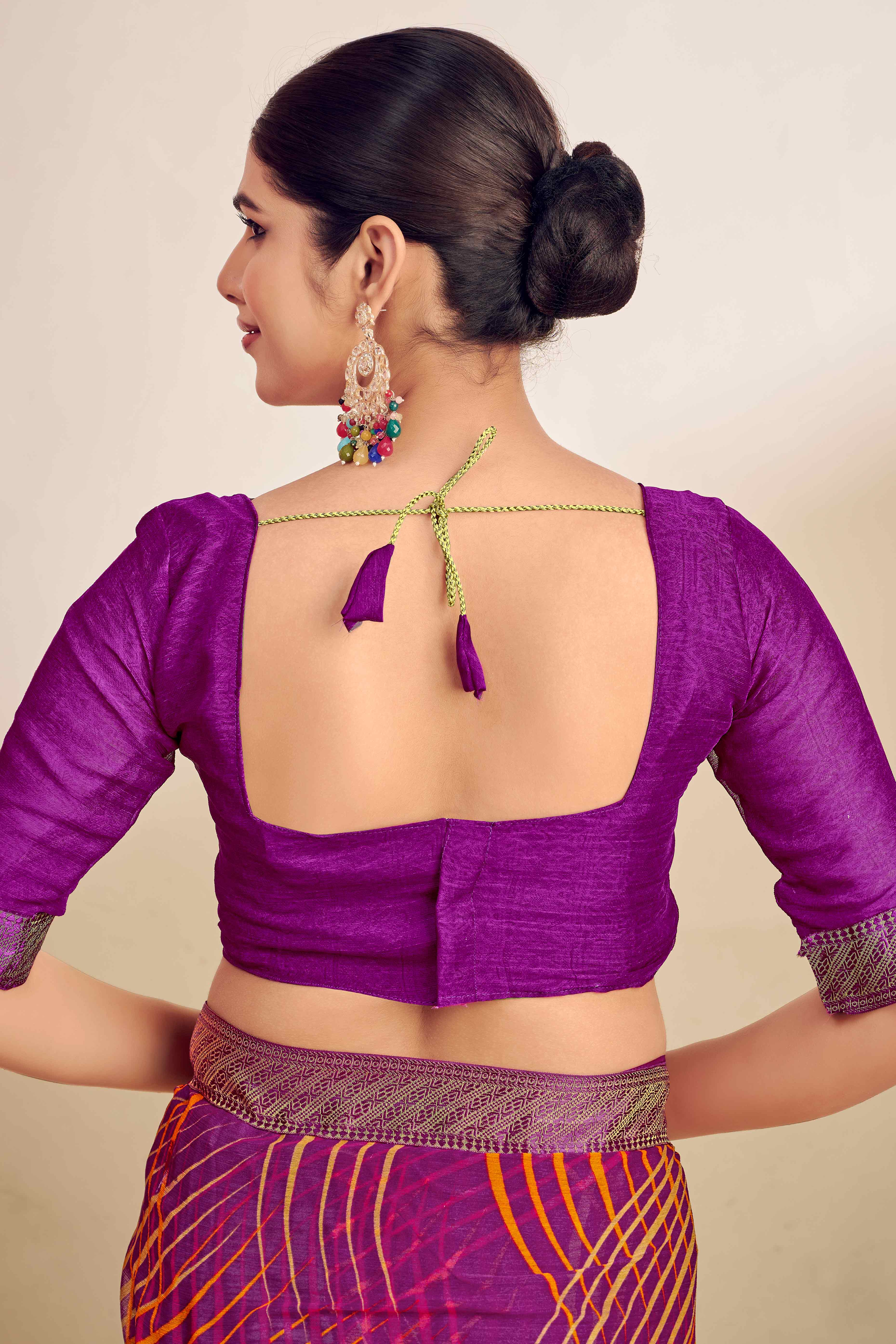 Purple Chiffon Saree Adorned With Artistic Print & Finely Crafted Woven Lace Border