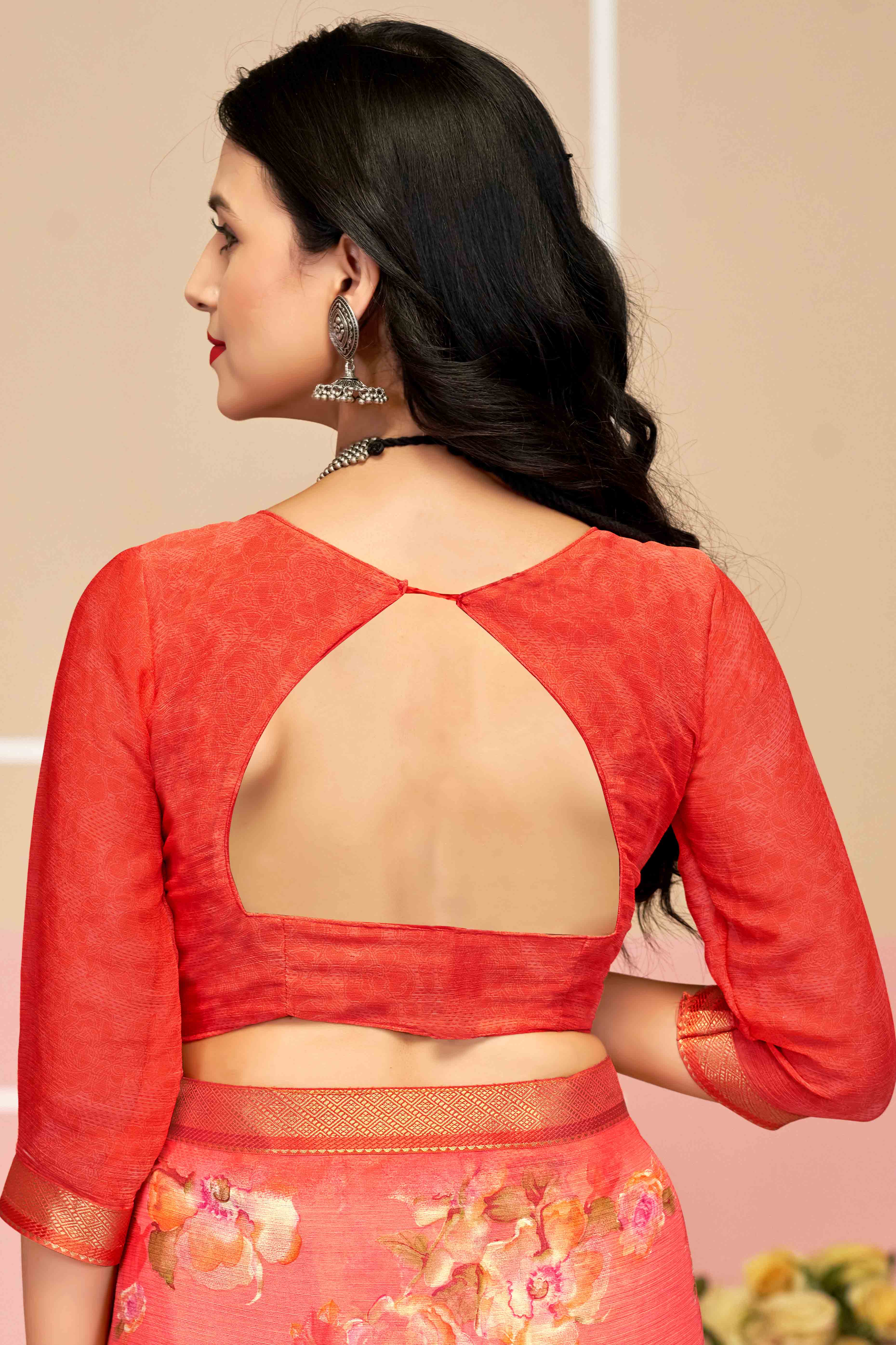 Elegant Floral Printed Chiffon Saree In Salmon Pink with Delicate Woven Lace Border