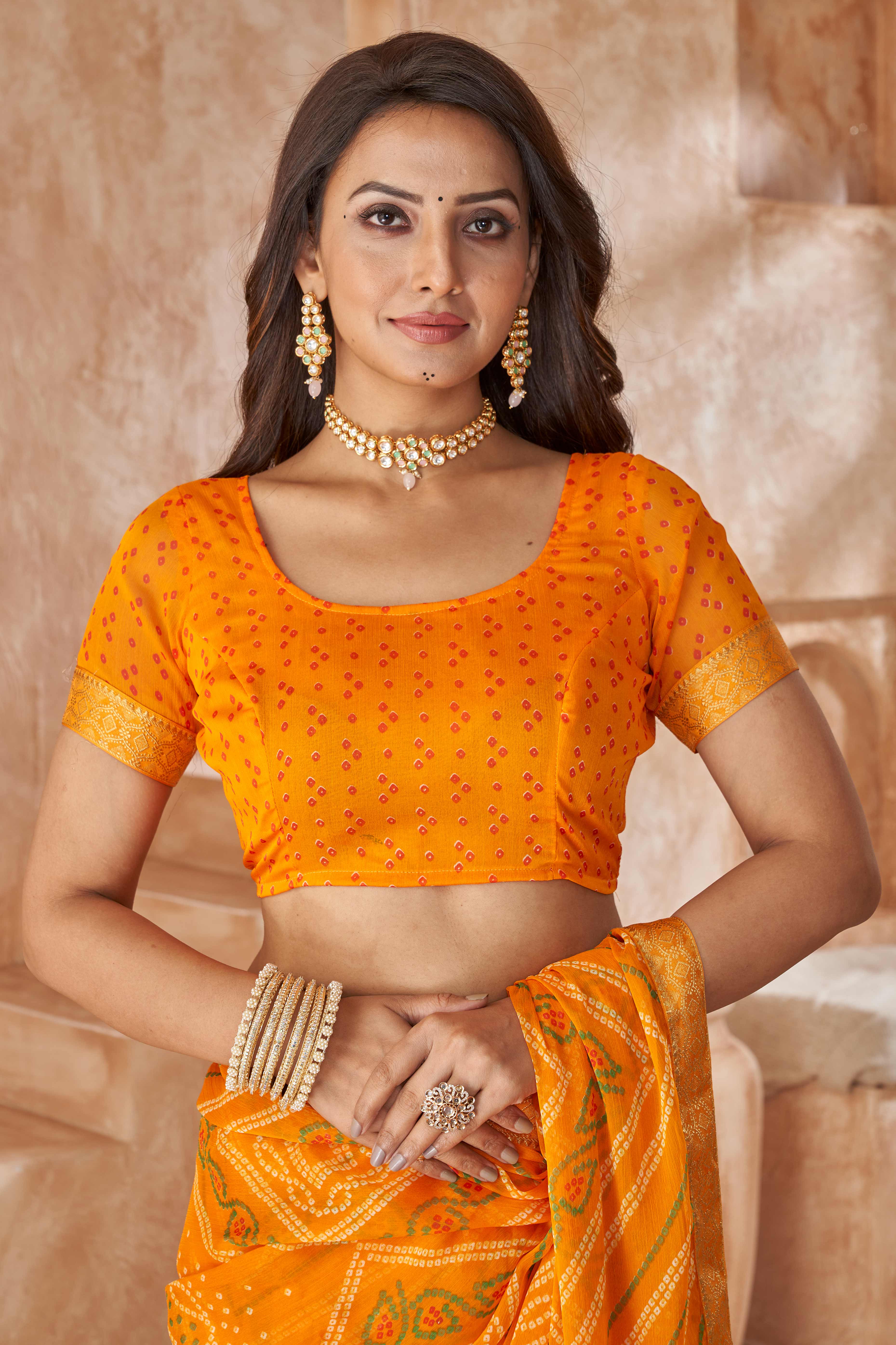 Mustard Chiffon Saree Featuring Traditional Bandhani Prints & A Graceful Lace Edge