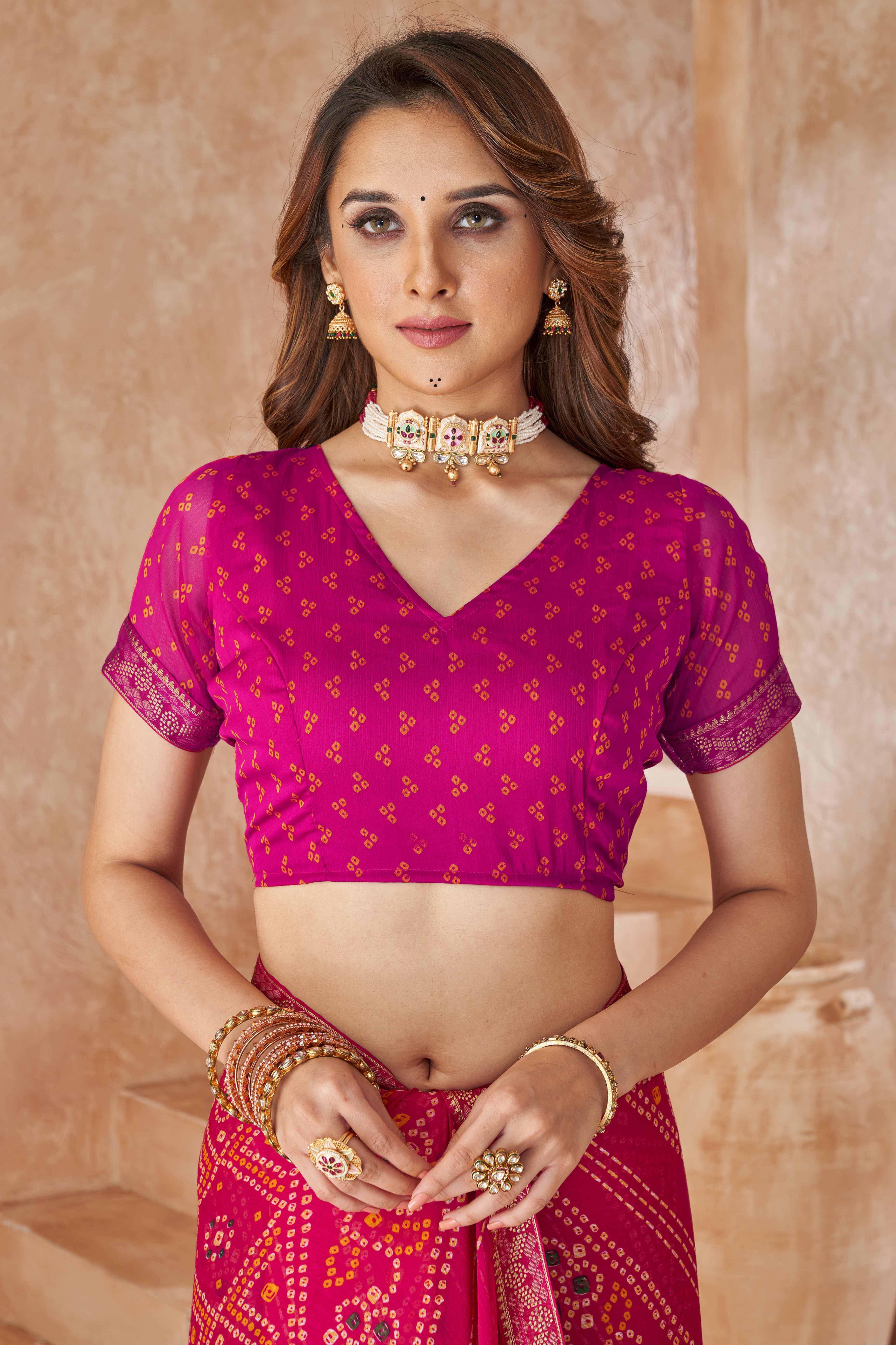 Magenta Chiffon Saree Featuring Traditional Bandhani Prints & A Graceful Lace Edge