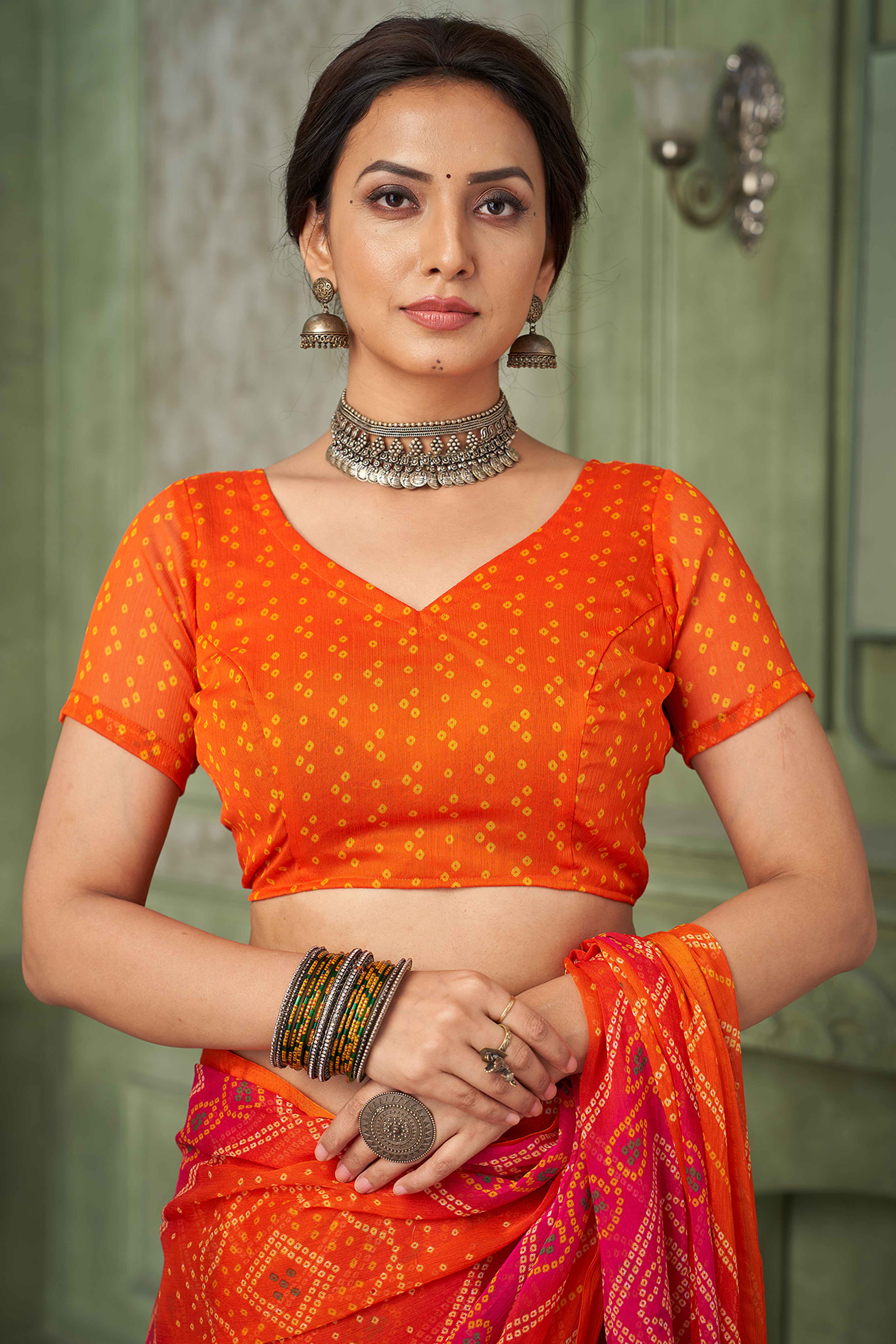 Orange Chiffon Saree Adorned With Traditional Bandhani Print