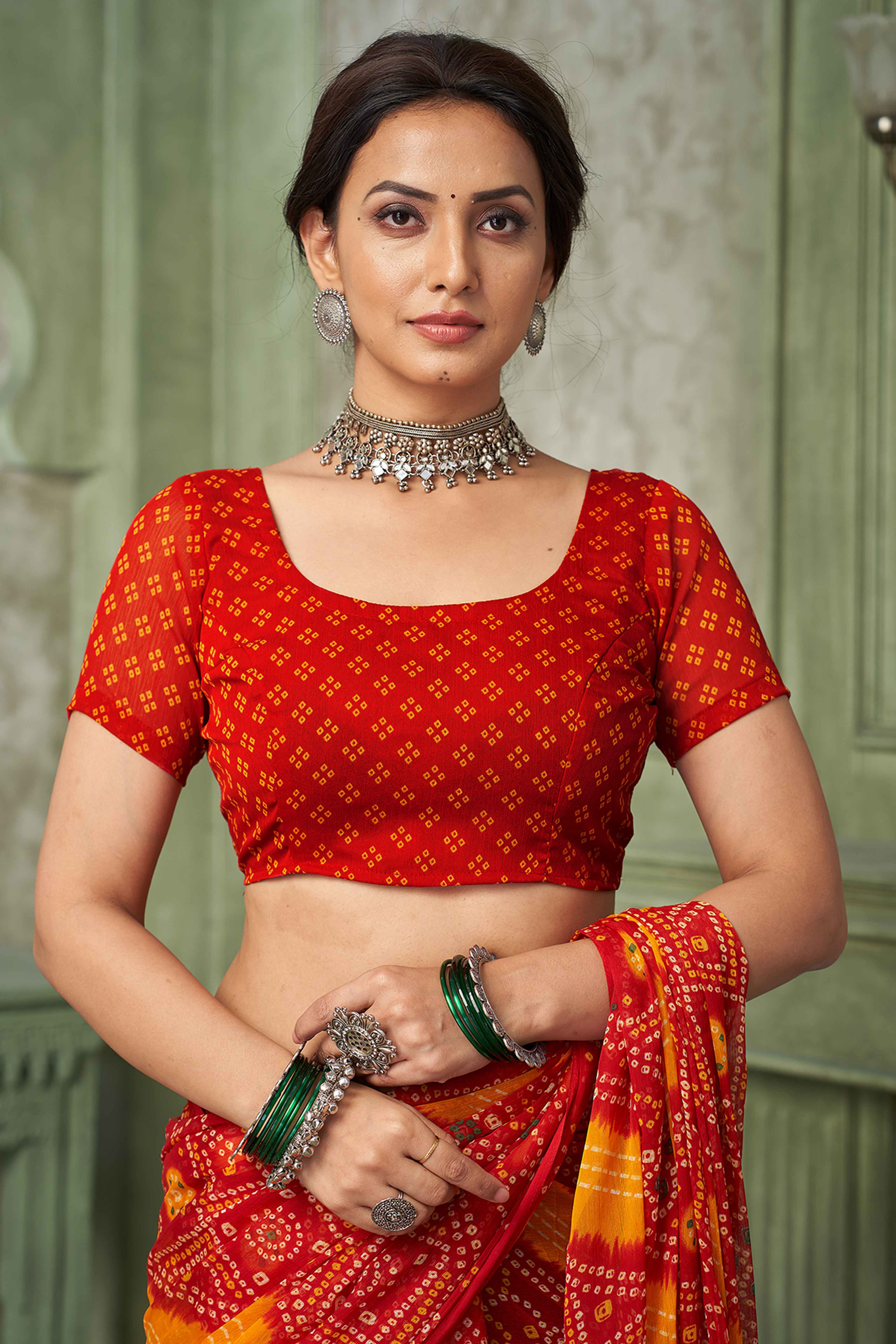 Red Chiffon Saree Adorned With Traditional Bandhani Print