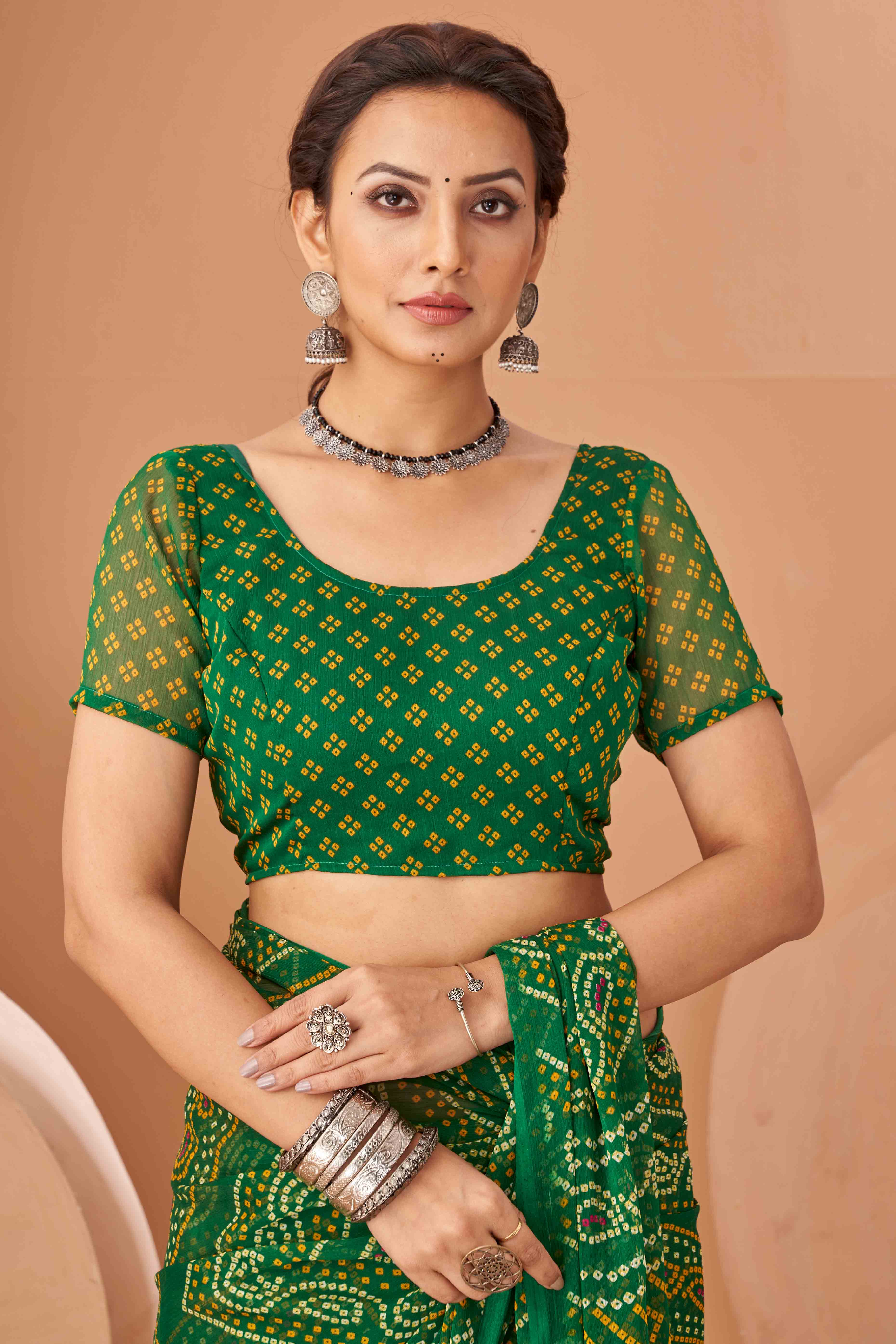 Green Bandhani Printed Chiffon Saree Accented With Intricate Lace Border Work