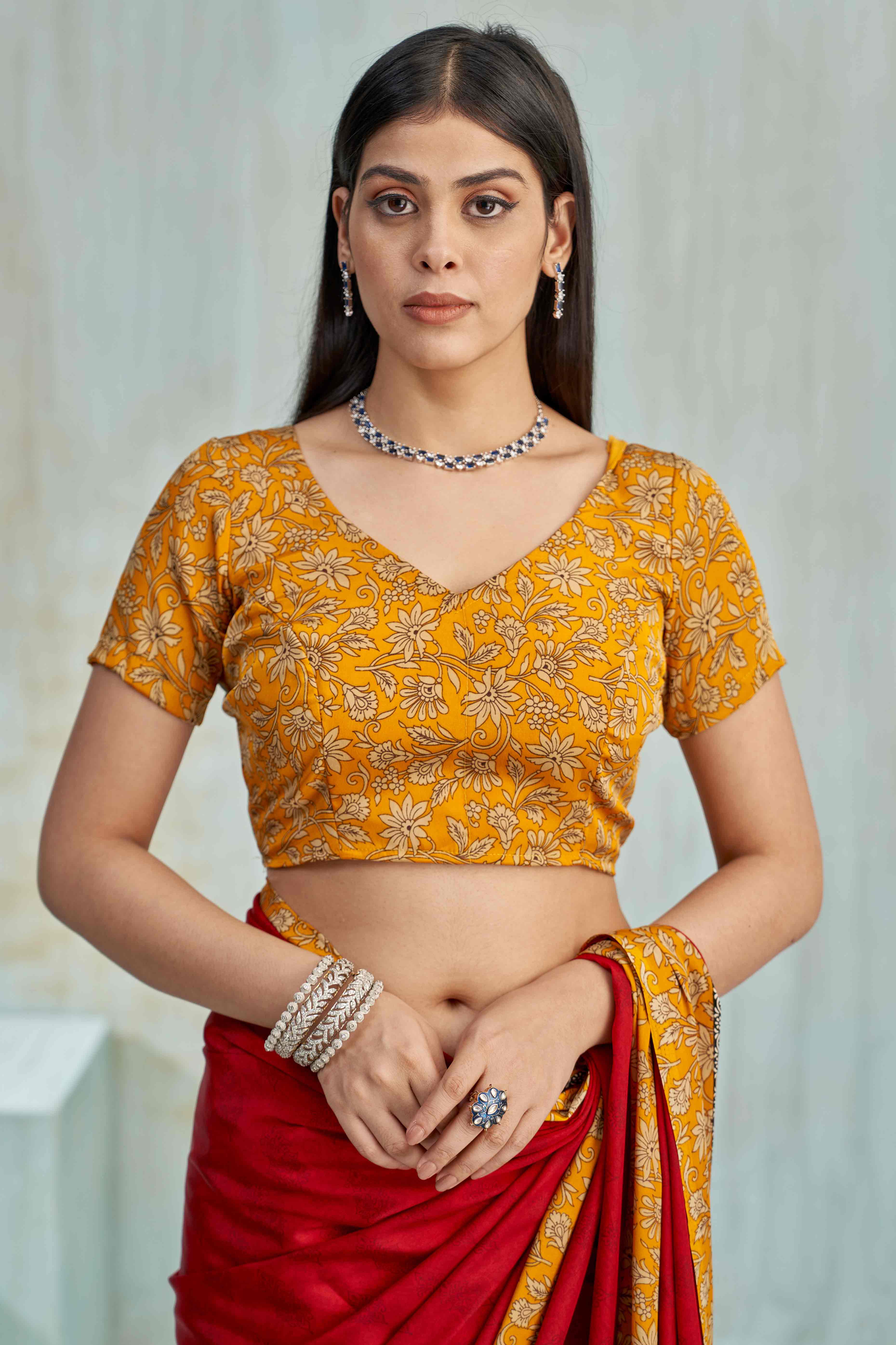 Red Crepe Silk Saree Featuring Delicate Floral Print Work