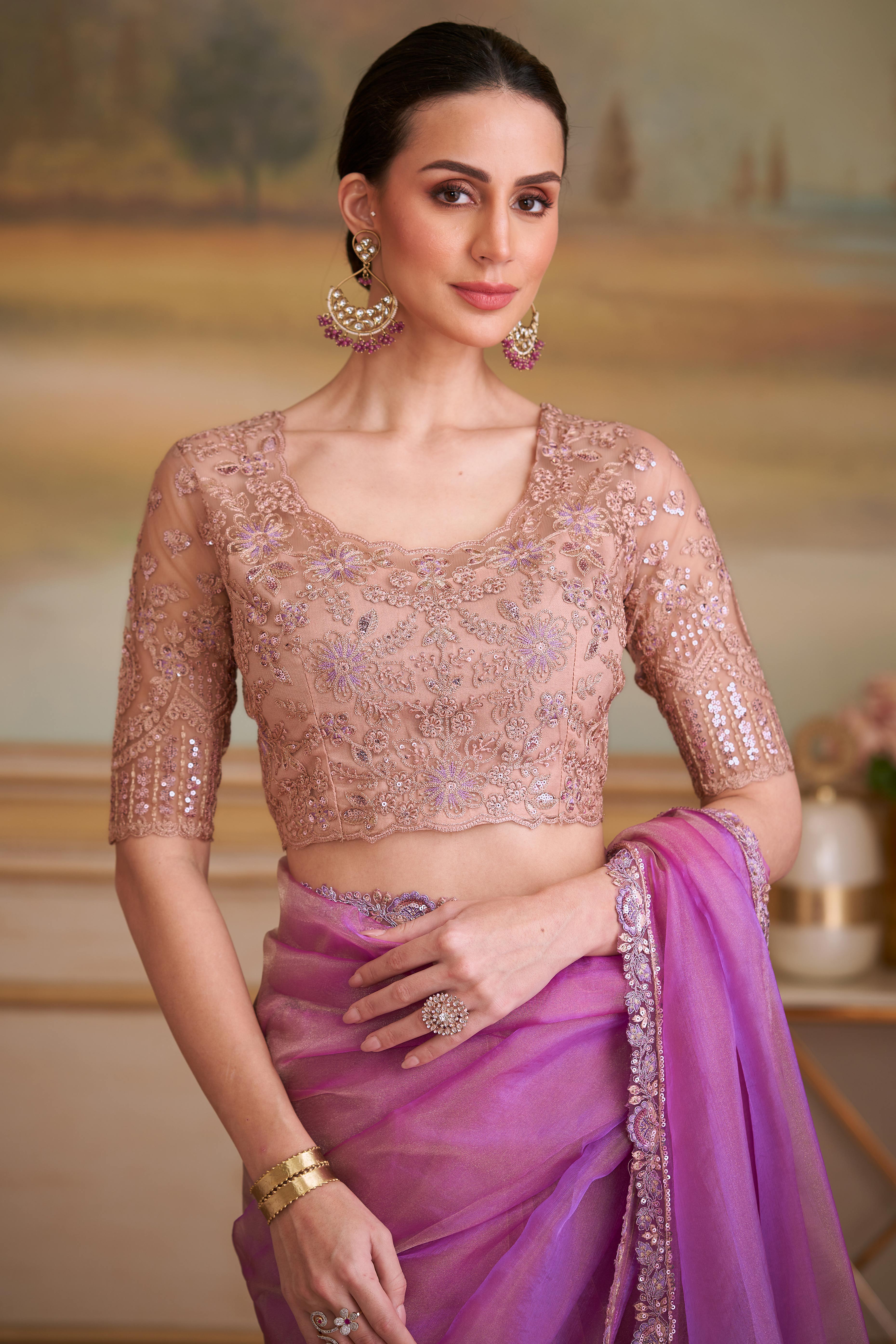 Lustrous Light Magenta Solid Tissue Silk Saree Showcasing Sequins Embroidered & Stylish Lace Border