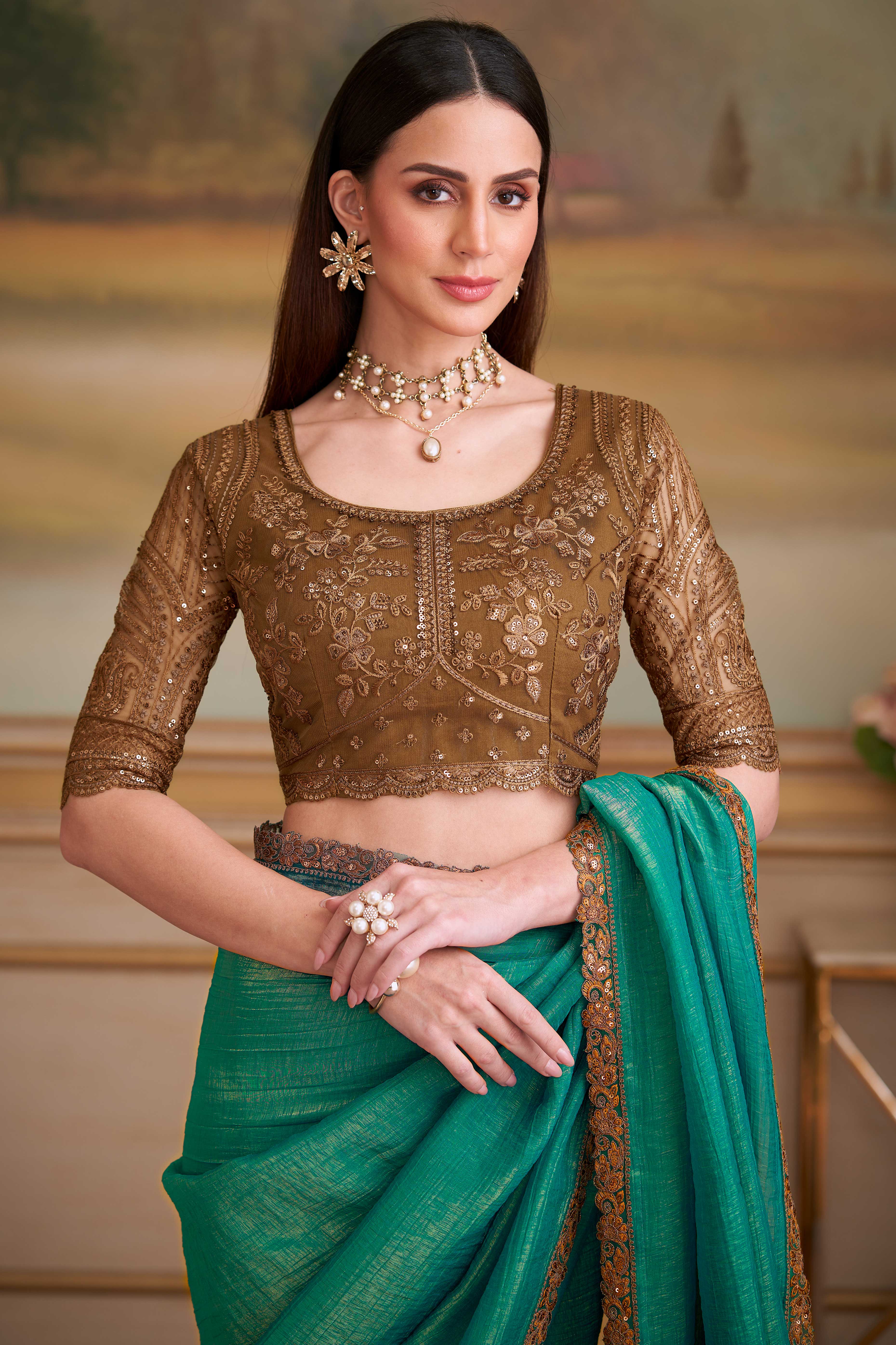 Stylish Light Sea Green Georgette Saree Featuring Floral Sequins Embroidered Designer Lace Border