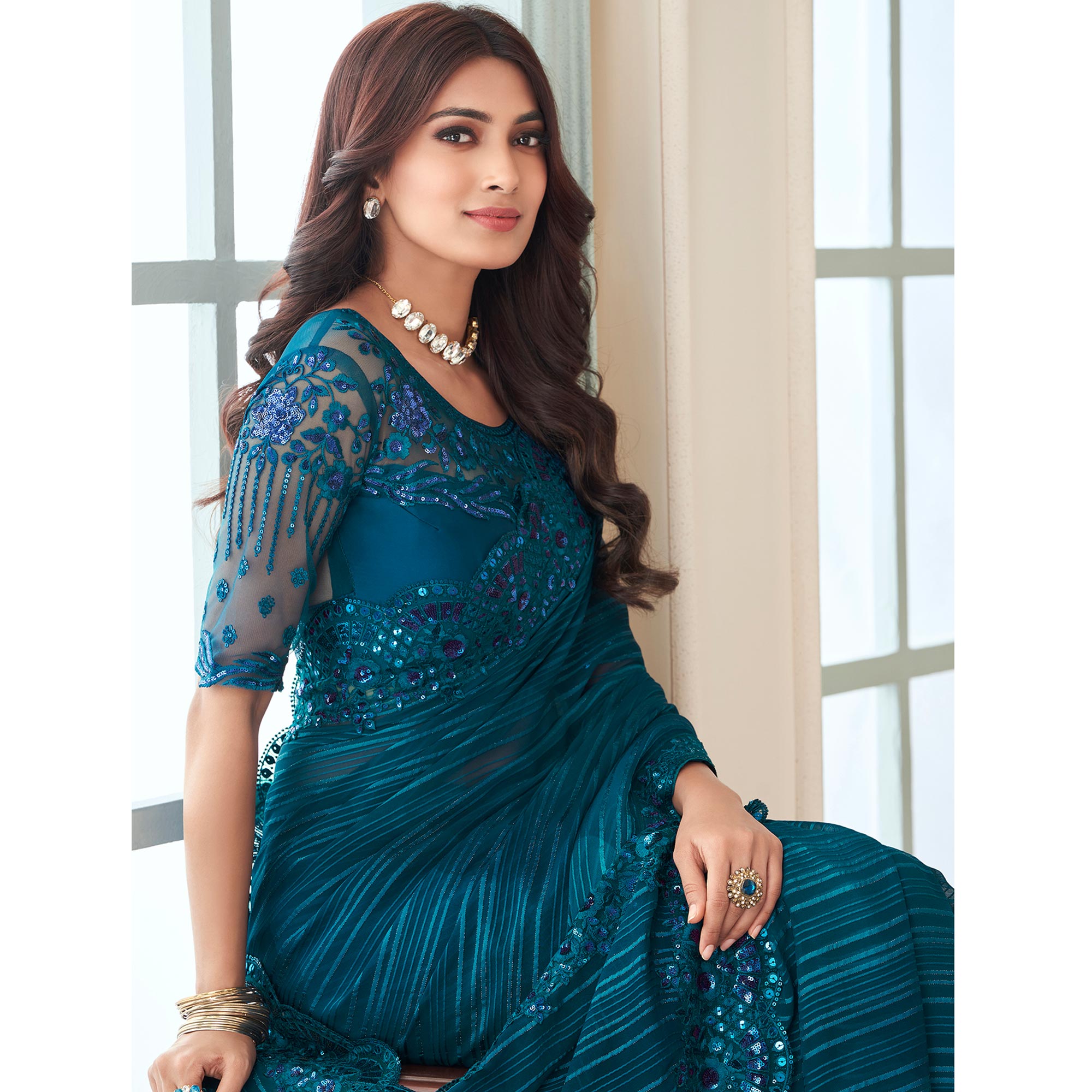 Teal Sequins Embroidered Satin Saree