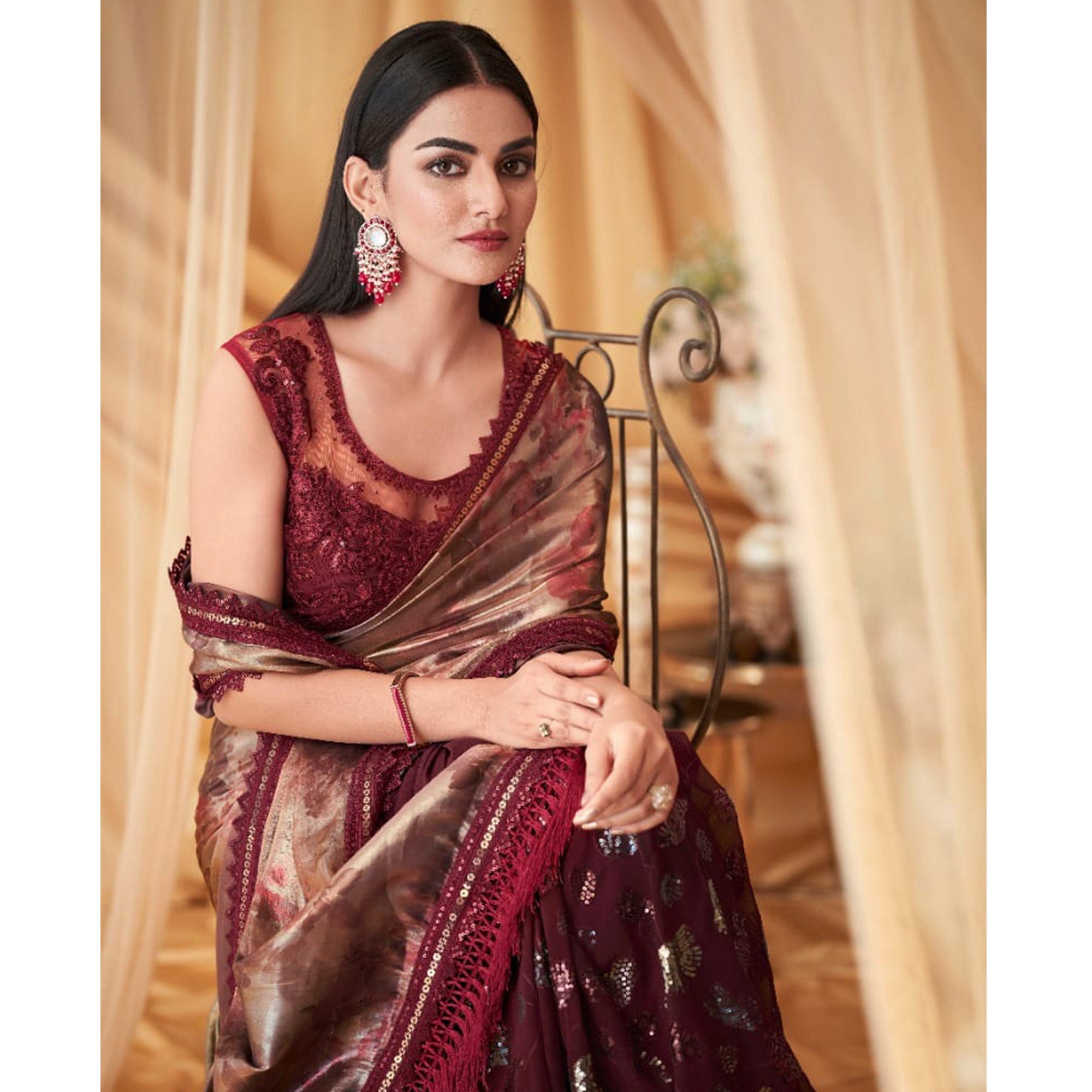 Maroon Sequins Embroidered Georgette Saree With Tassels