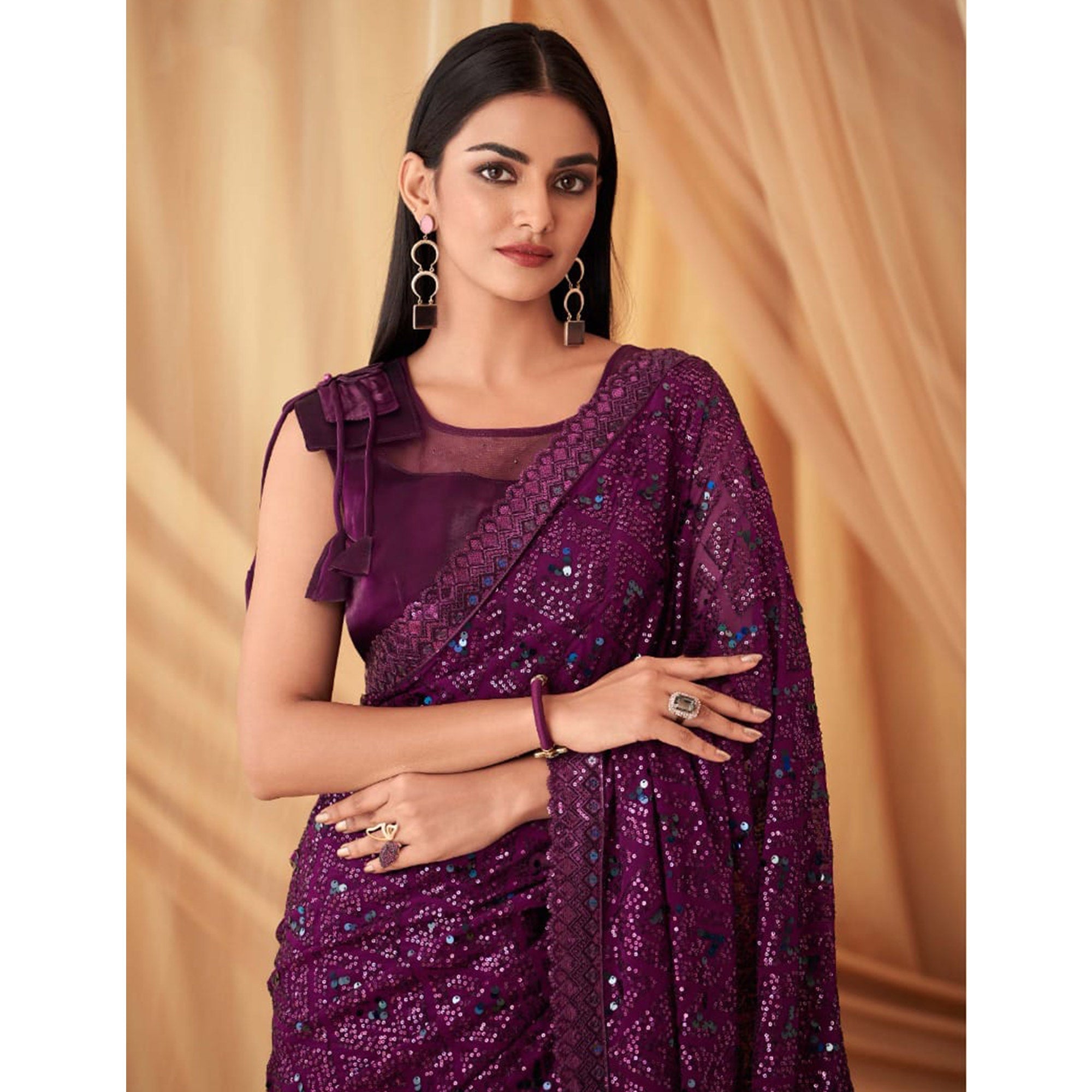 Purple Sequins Embroidered Georgette Saree With Tassels