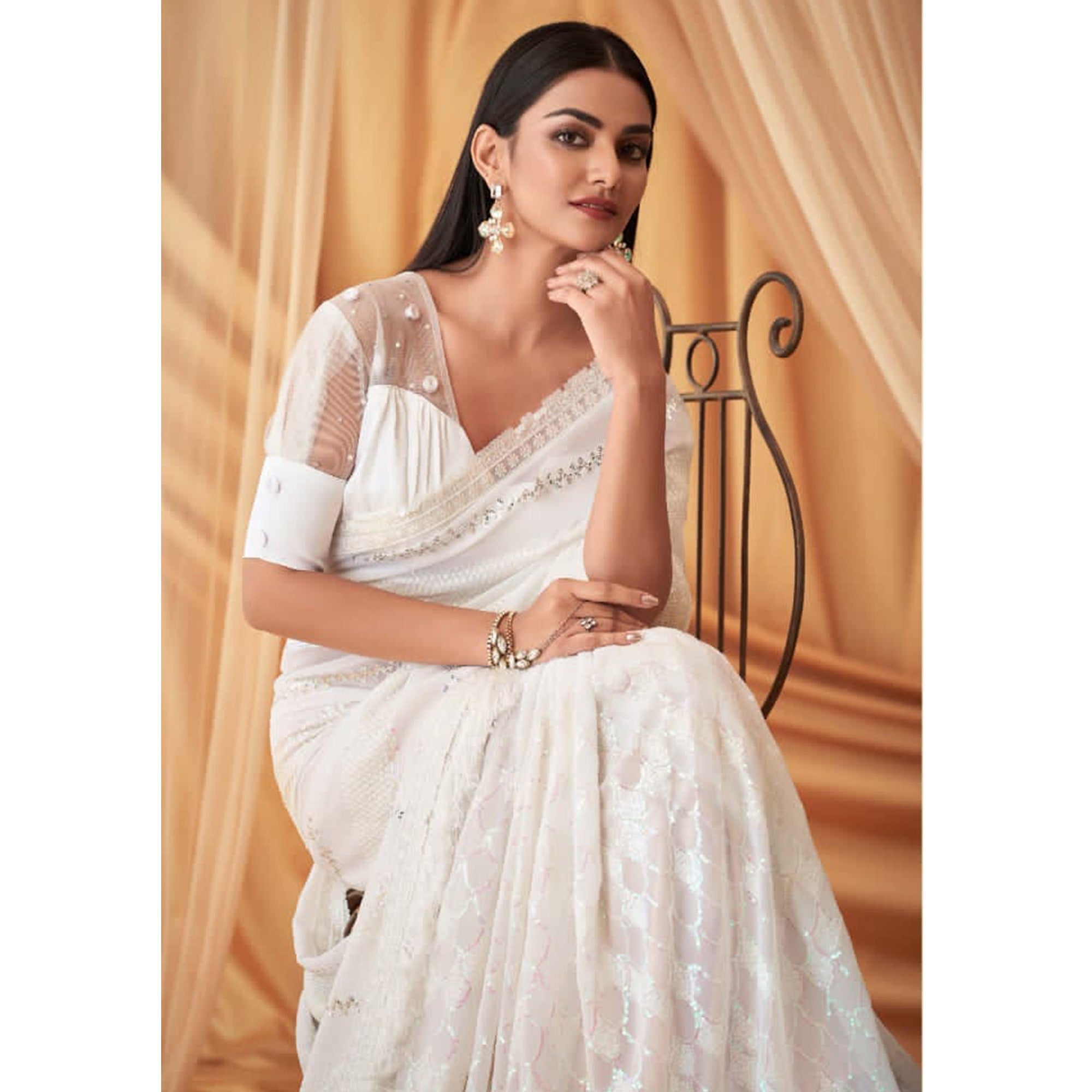 White Sequins Embroidered Georgette Saree With Tassels
