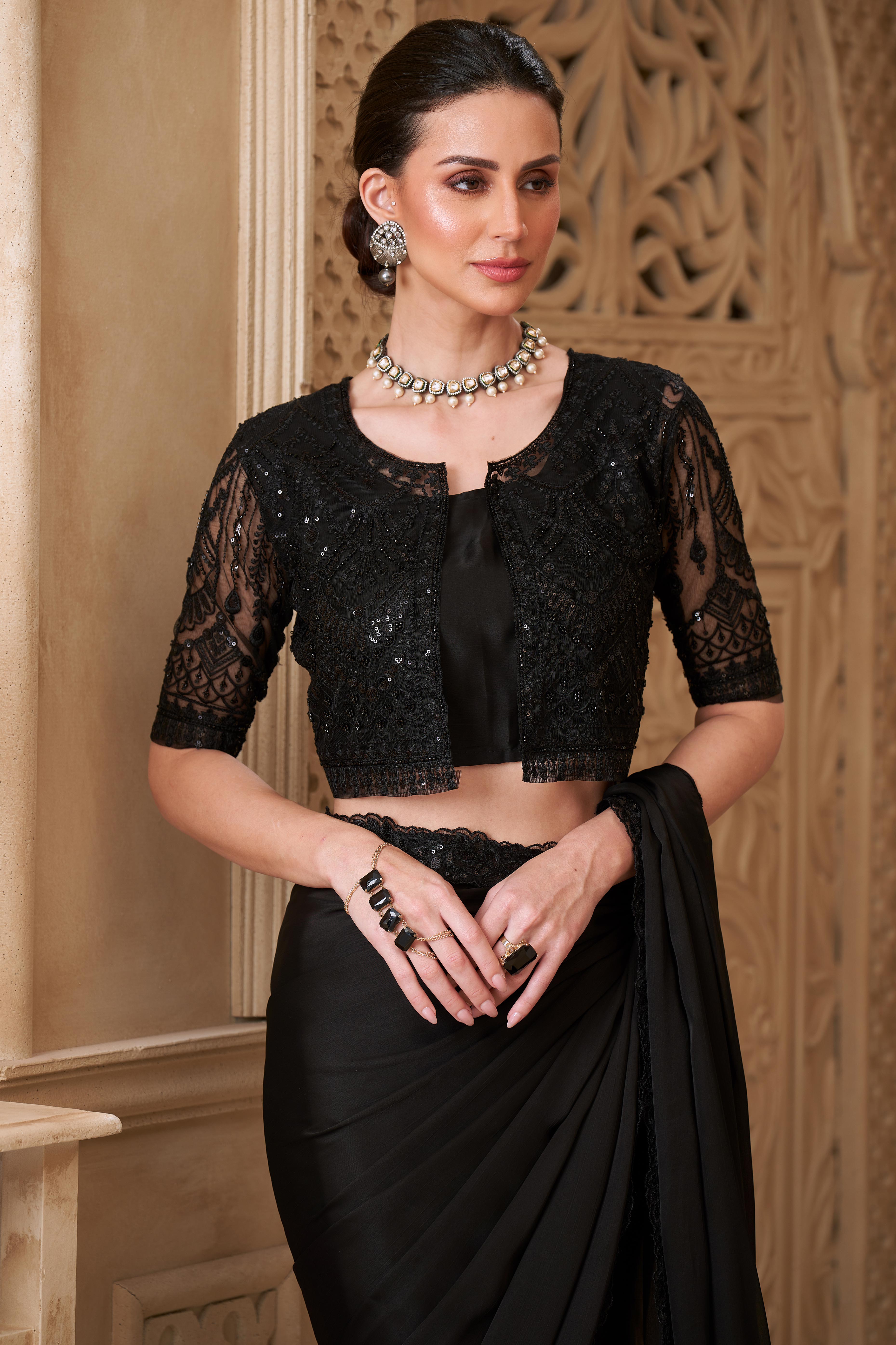 Shimmering Black Georgette Saree with Graceful Thread Embellishment and Sequins