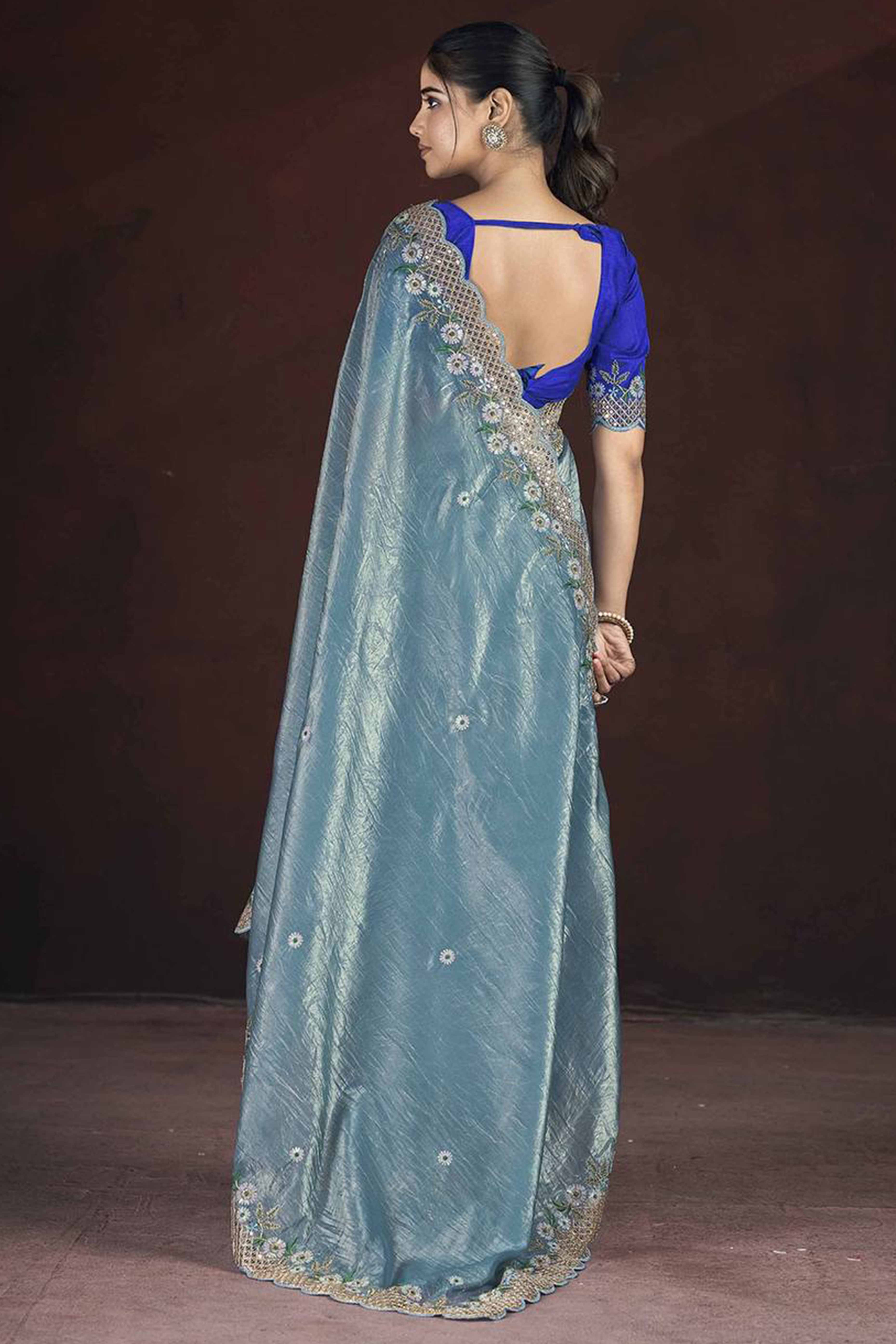 Blue Organza Saree with Embroidery on the Edges for a Graceful Contemporary Look