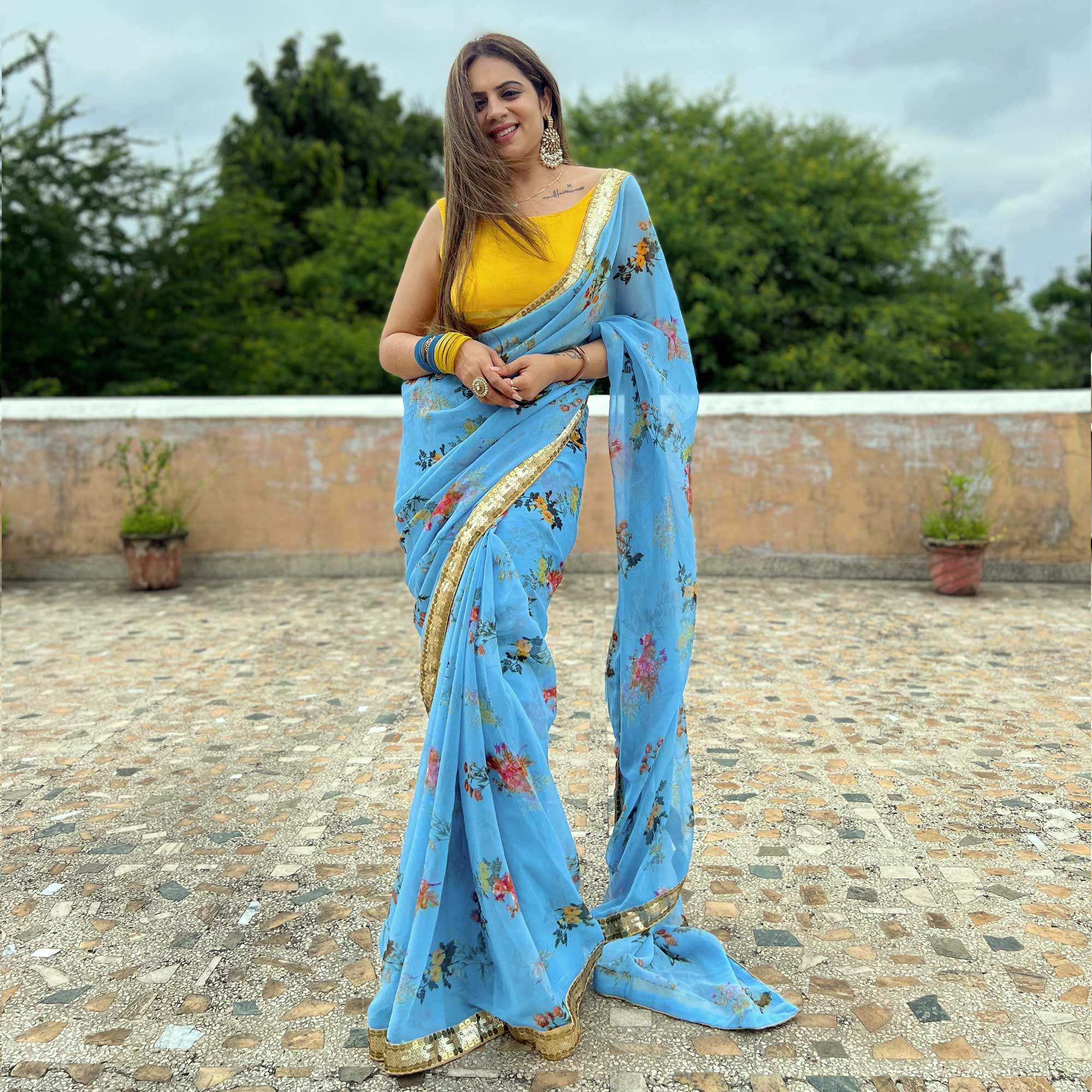 Blue Printed With Sequins Border Georgette Saree