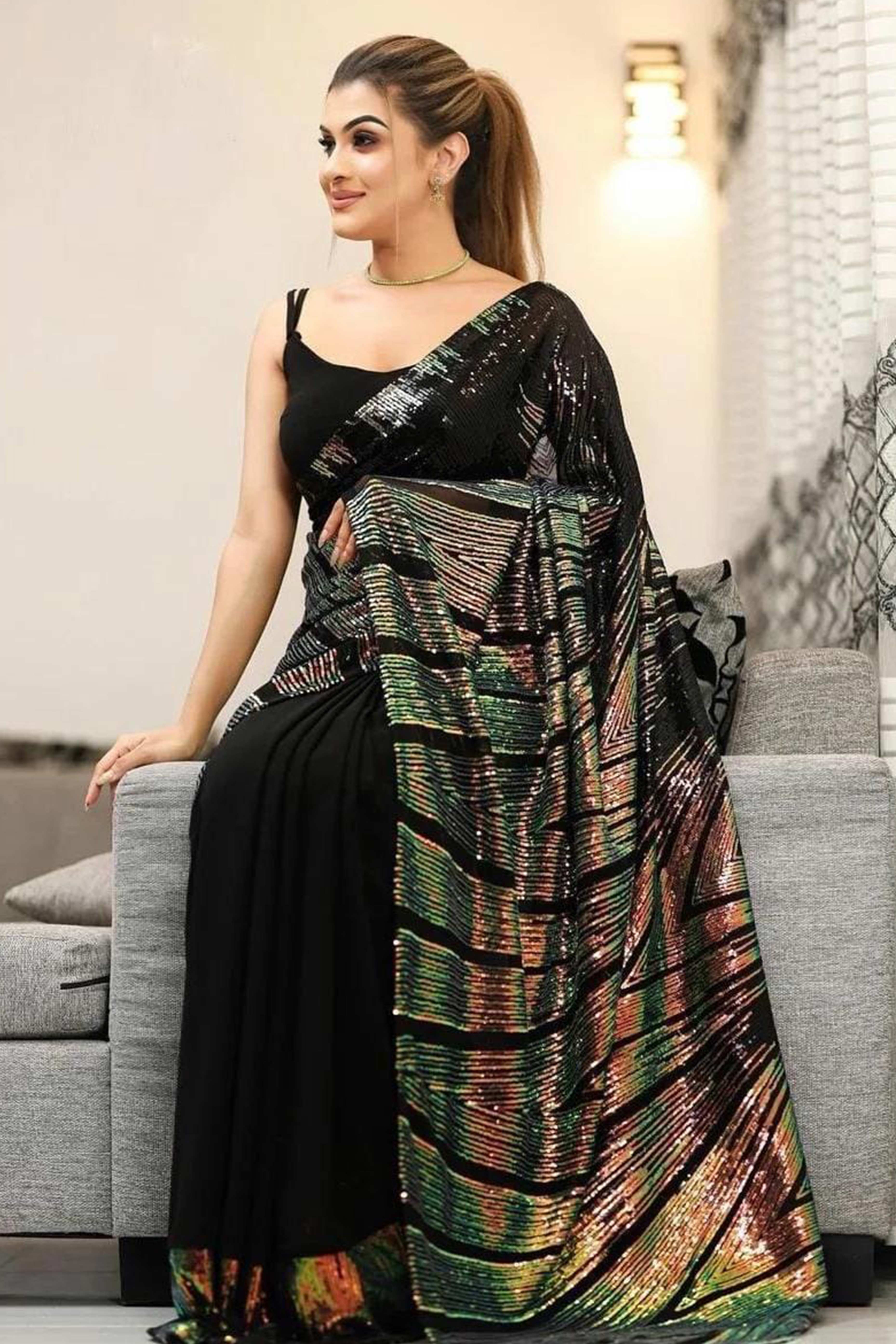 Stunning Black Georgette Partywear Saree Adorned with All-Over Sequin Embellishments