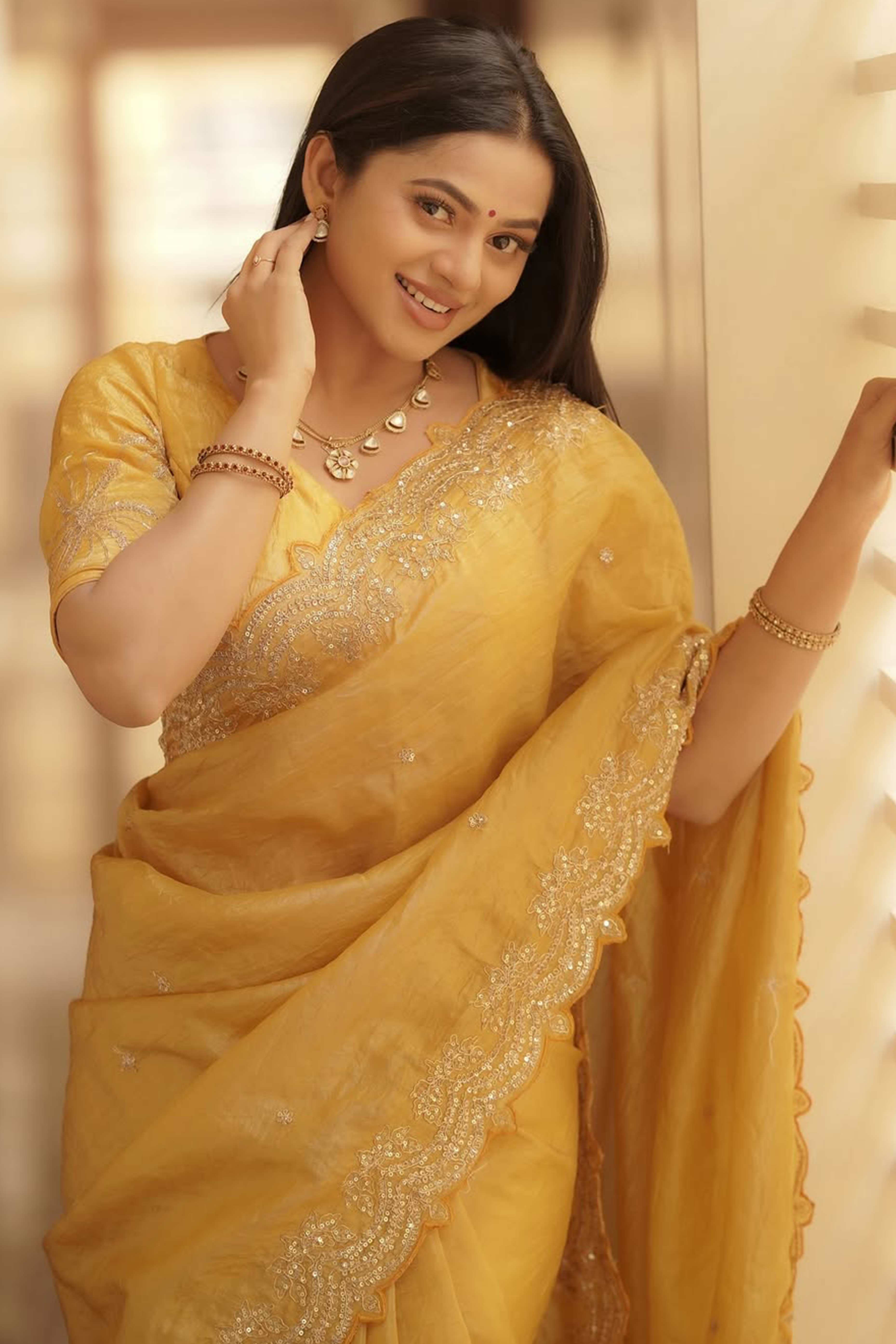 Golden Silk Blend Saree Accented with Sparkling Sequin Embellished