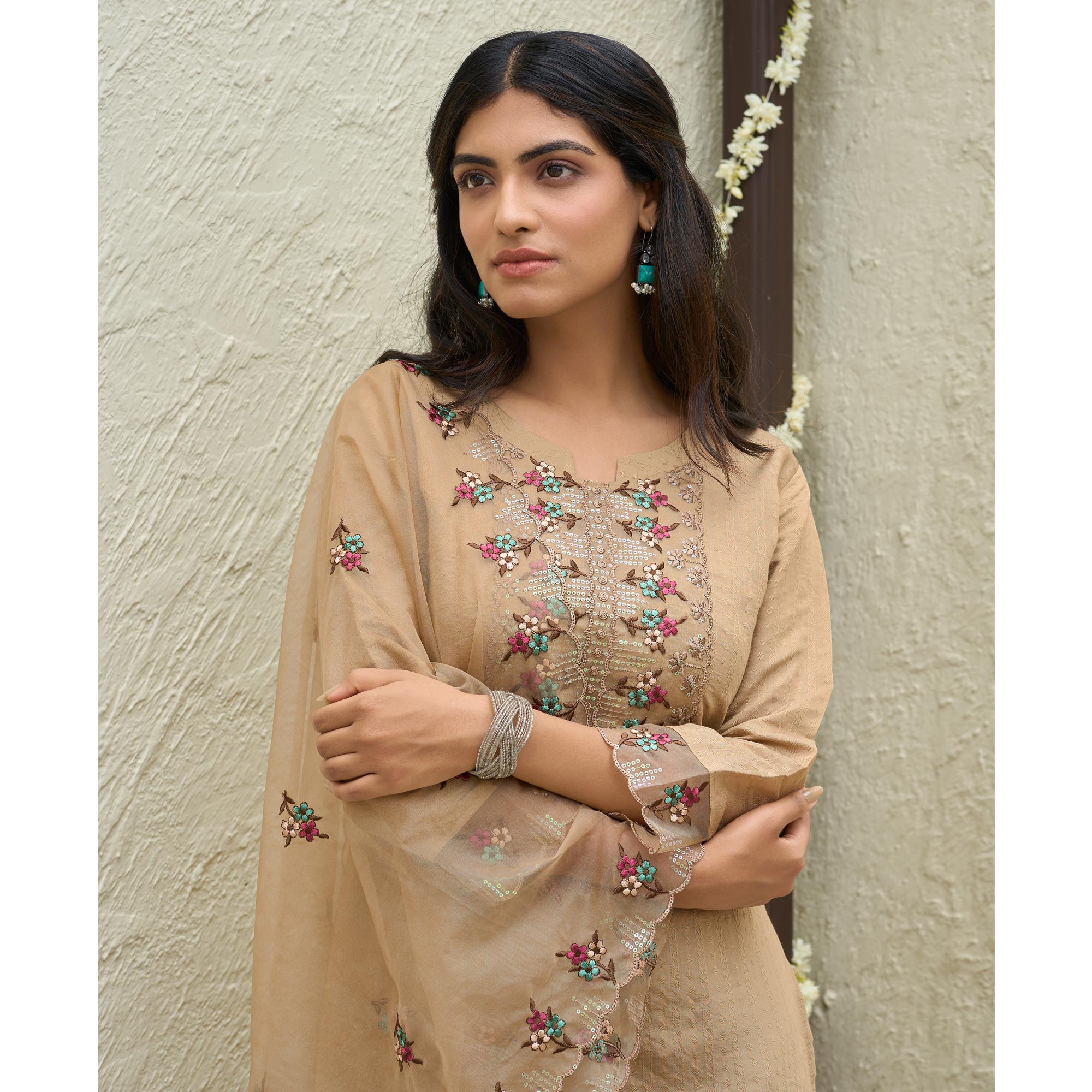 Chikoo Floral Embroidered Rayon Salwar Suit