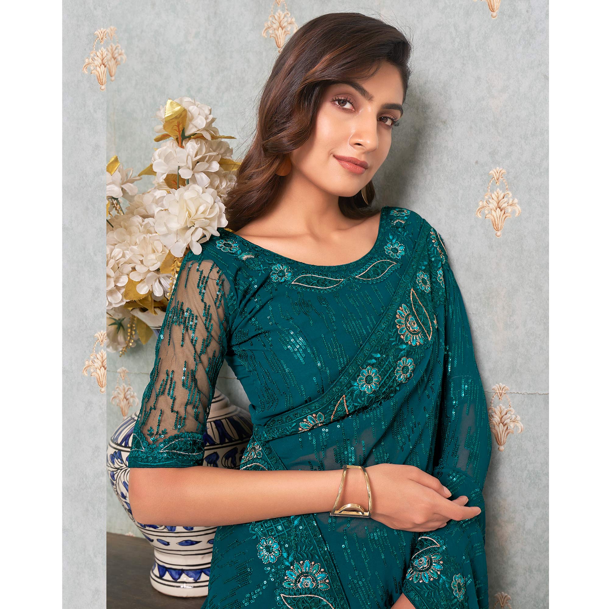 Teal Sequins Embroidered Georgette Saree