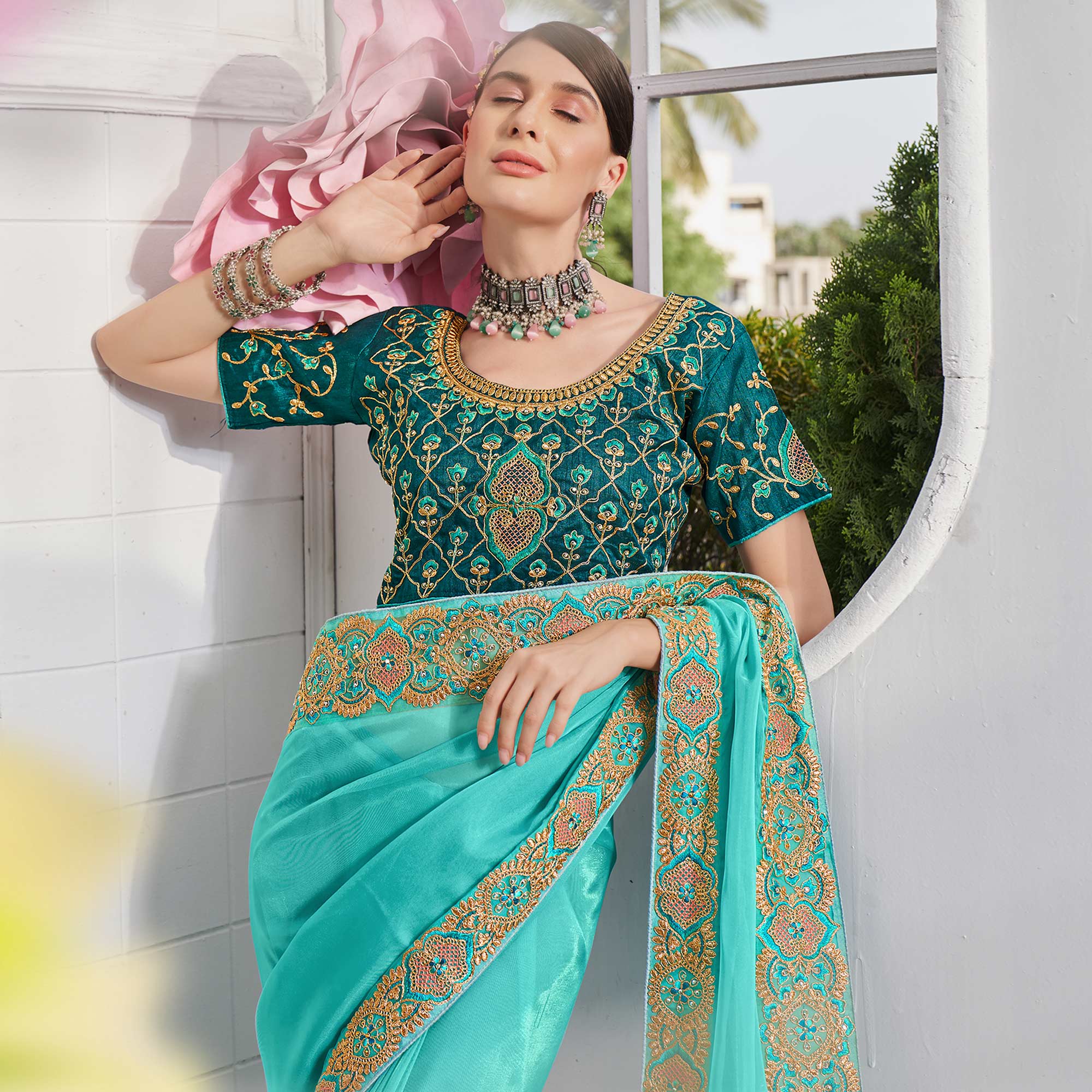 Aqua Blue Solid With Embroidered Border Organza Saree