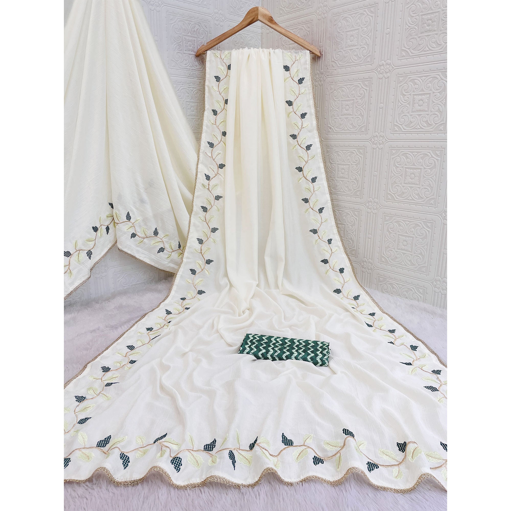 Elegant Offwhite & Green Pure Silk Saree With Intricate Thread Embroidery And Delicate Lace Border