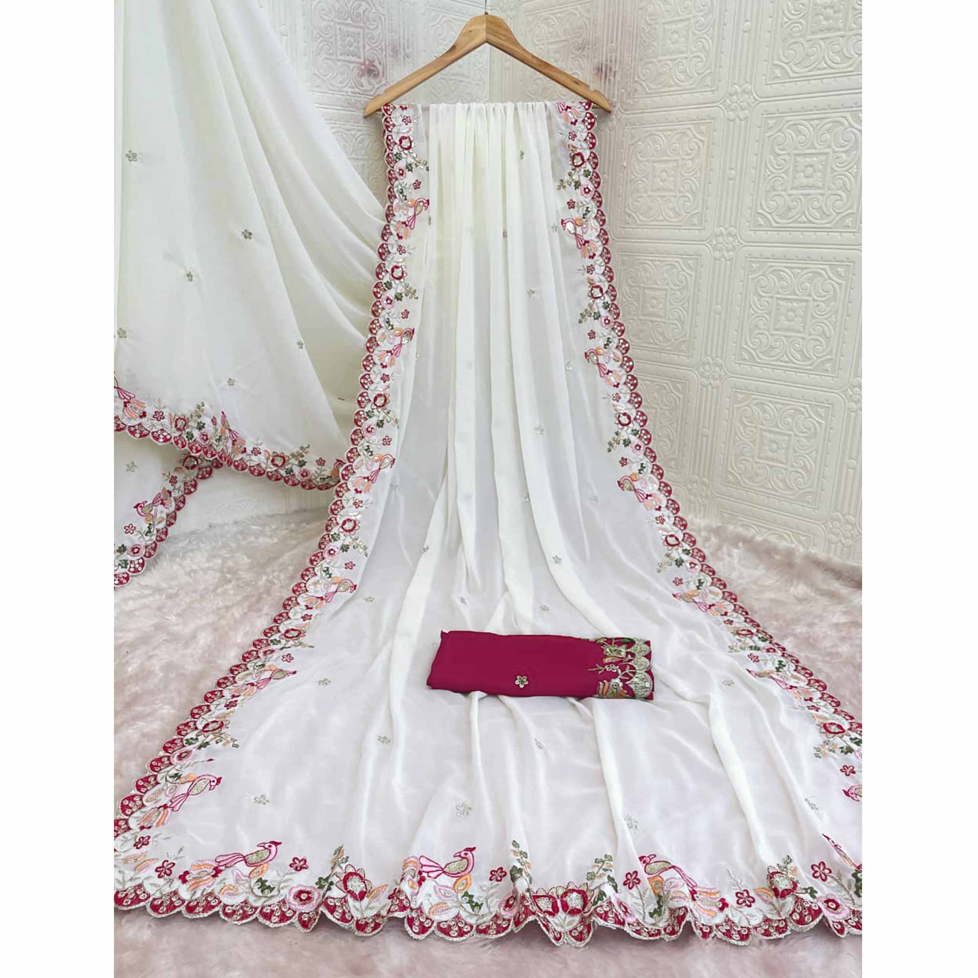 Stylish Off White Georgette Partywear Saree with Beautifully Embroidered Border Detailing